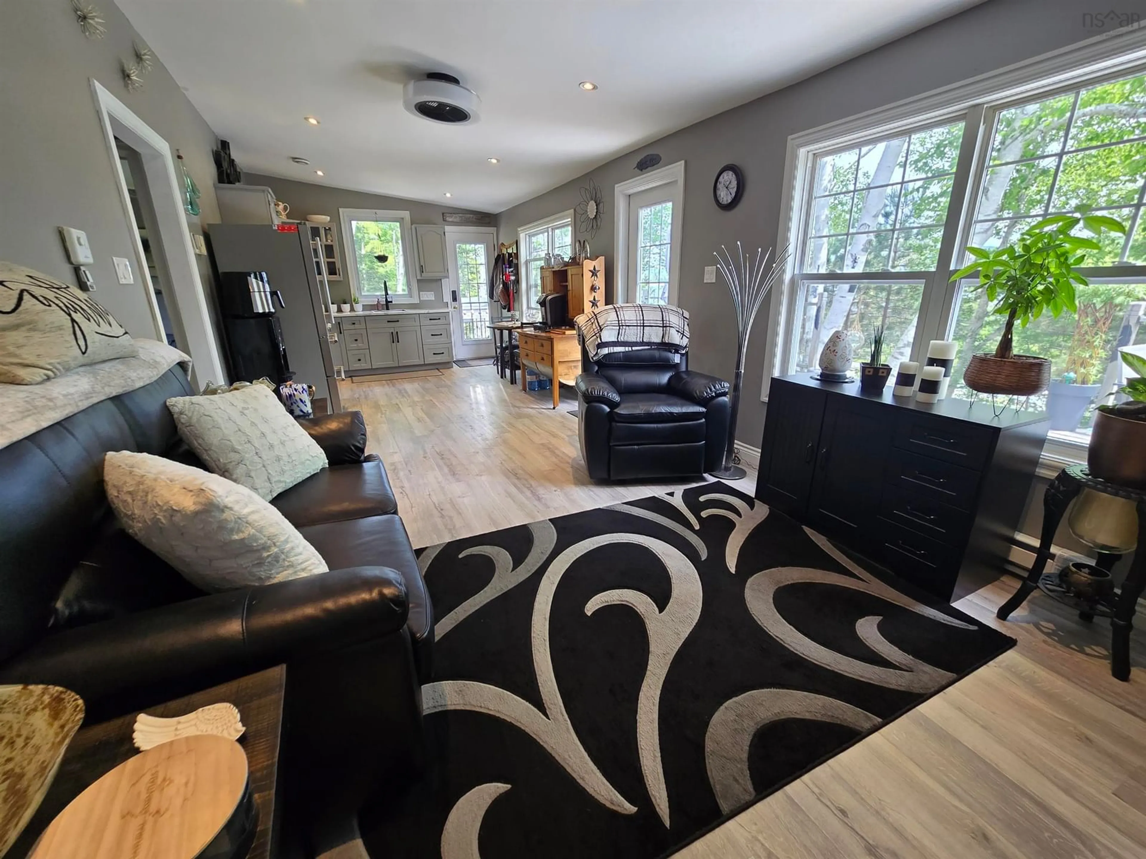 Living room with furniture, unknown for 21 Macgillivery Lane, North Side East Bay Nova Scotia B1J 1H5