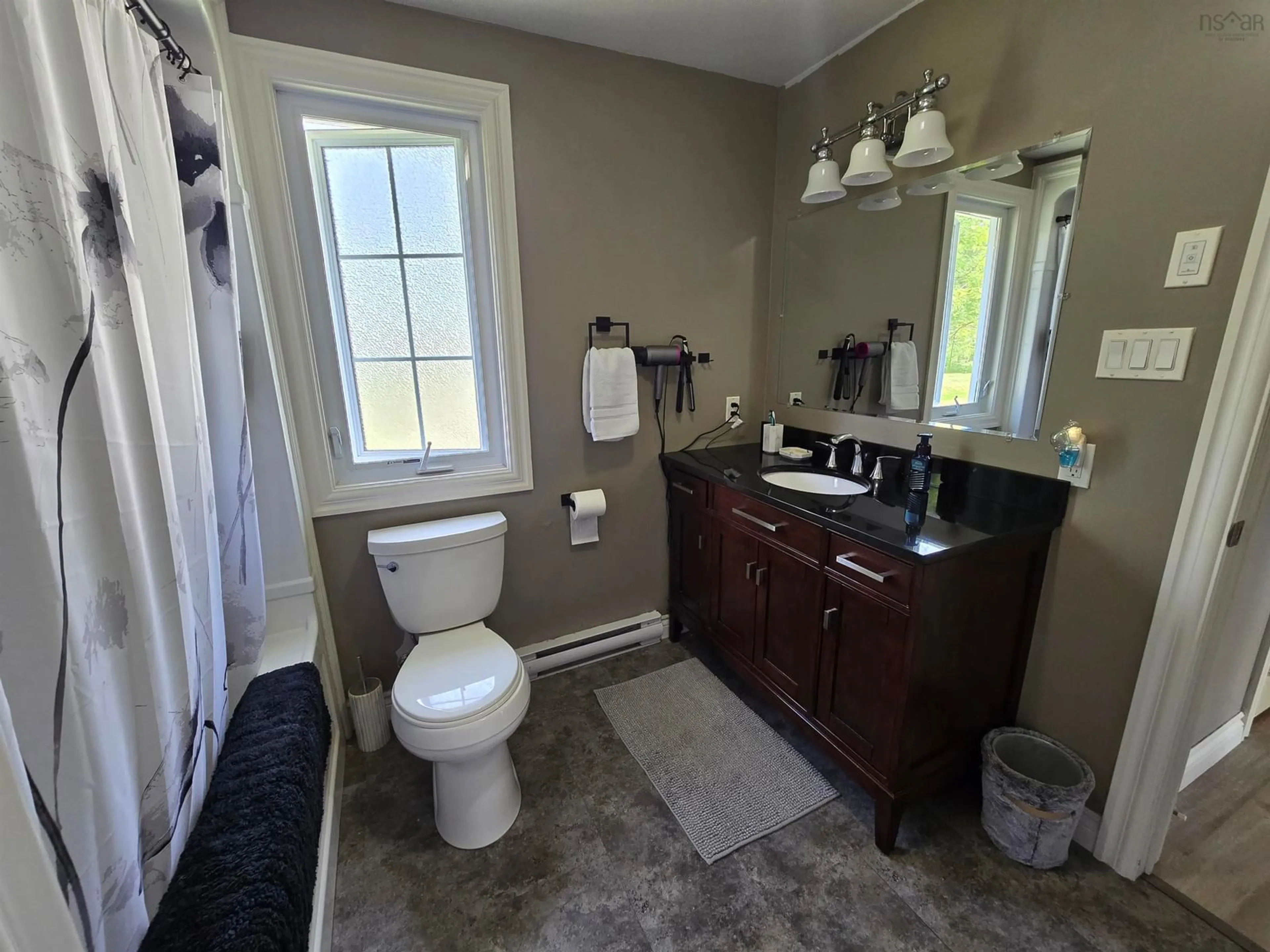 Standard bathroom, ceramic/tile floor for 21 Macgillivery Lane, North Side East Bay Nova Scotia B1J 1H5