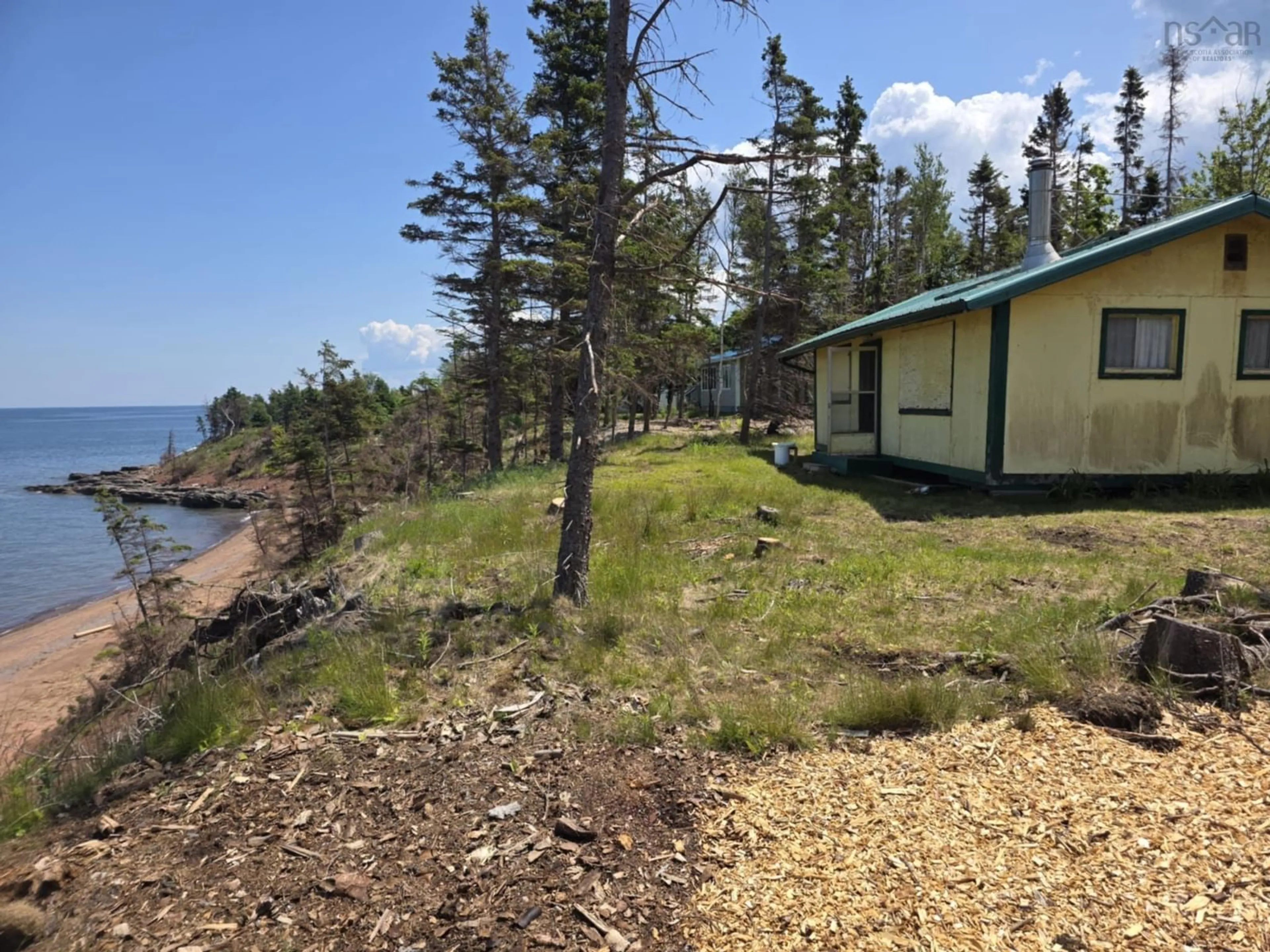 A pic from outside/outdoor area/front of a property/back of a property/a pic from drone, water/lake/river/ocean view for 764 Smith Point Rd, Fox Harbour Nova Scotia B0K 1Y0