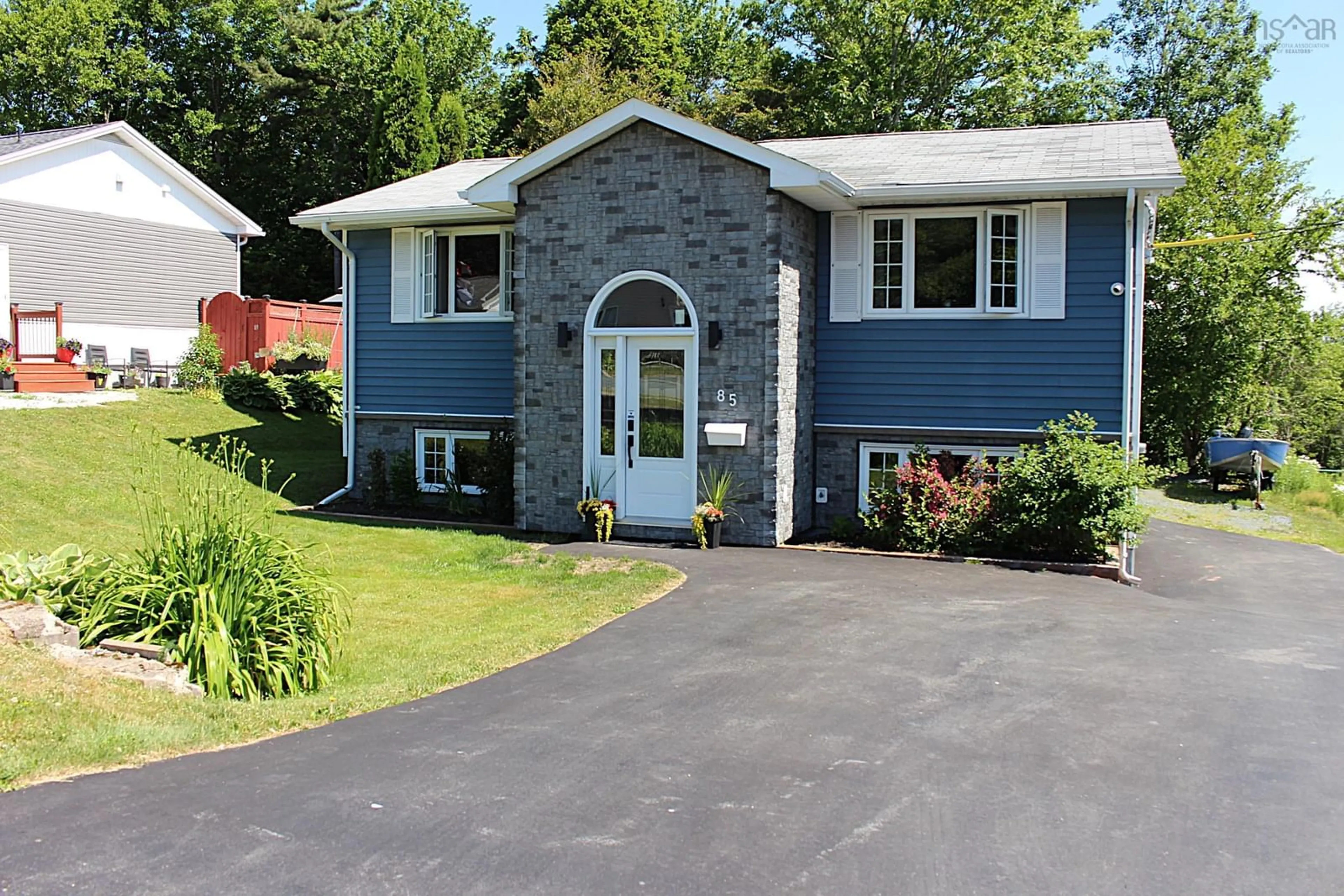 Home with vinyl exterior material, street for 85 Sycamore Lane, Lower Sackville Nova Scotia B4C 1E8