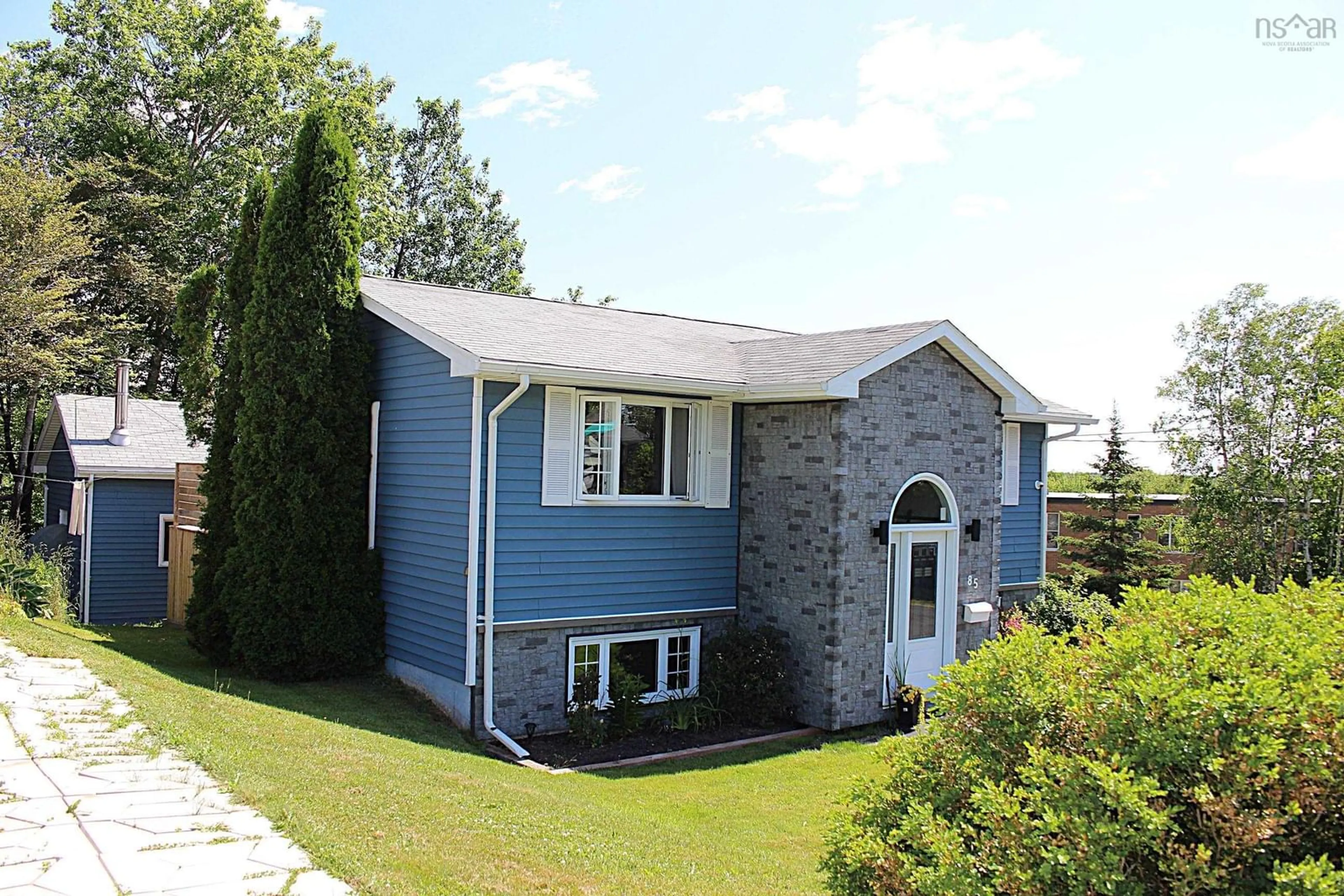 Home with vinyl exterior material, street for 85 Sycamore Lane, Lower Sackville Nova Scotia B4C 1E8