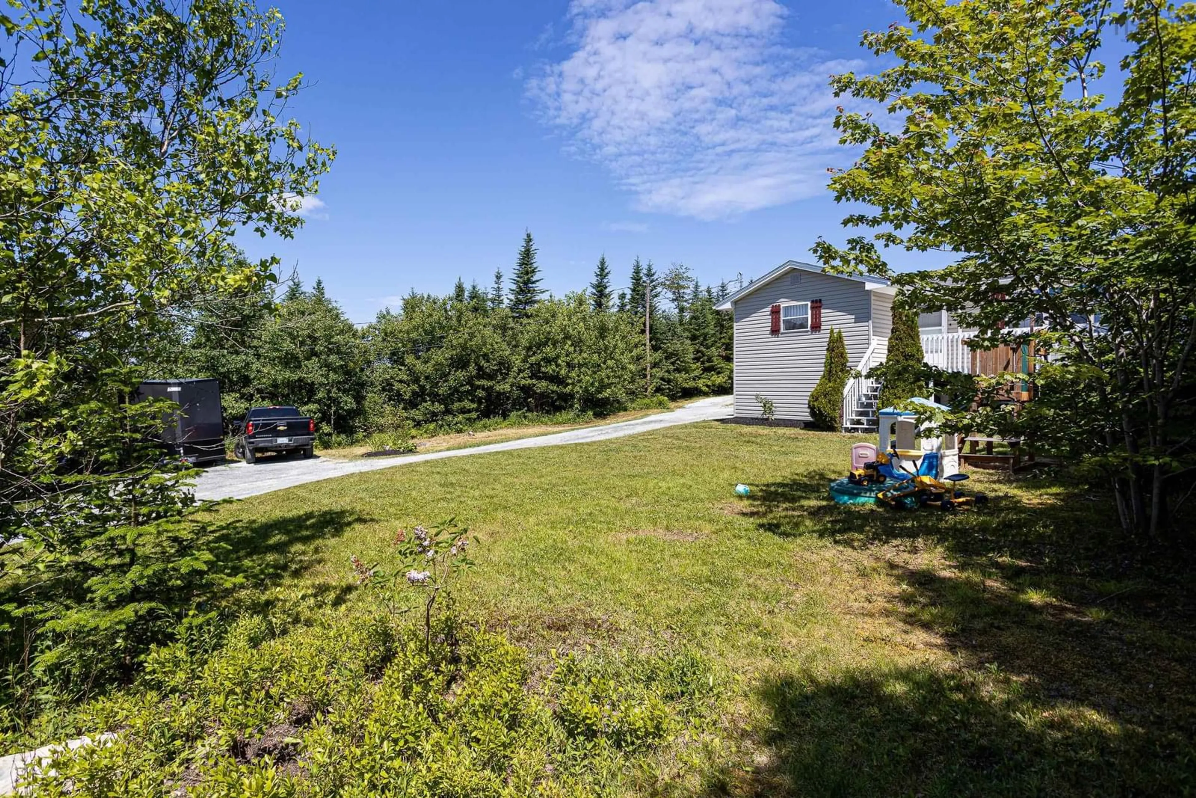 A pic from outside/outdoor area/front of a property/back of a property/a pic from drone, unknown for 229 Les Collins Ave., Porters Lake Nova Scotia B0J 2L0