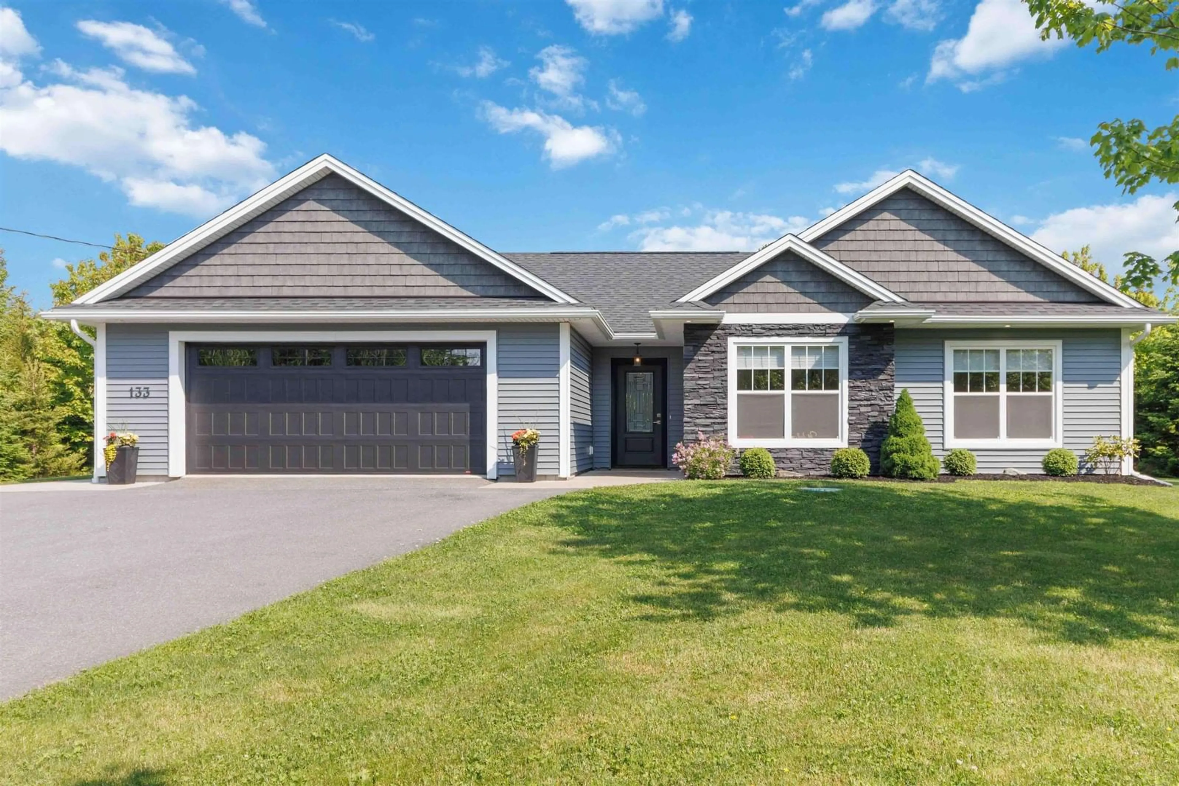 Home with vinyl exterior material, street for 133 Sugarwood, Porters Lake Nova Scotia B3E 0A9