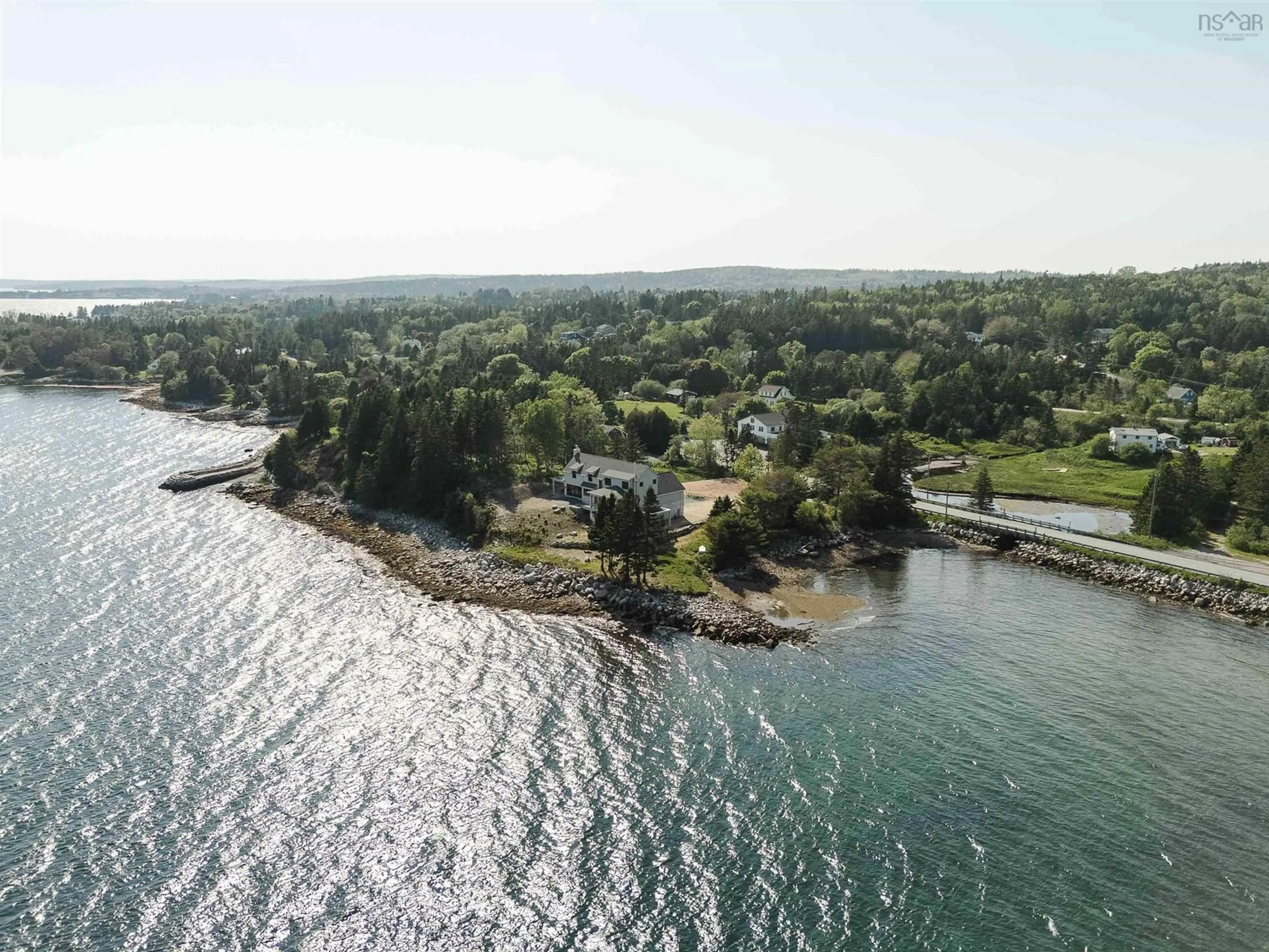 A pic from outside/outdoor area/front of a property/back of a property/a pic from drone, water/lake/river/ocean view for 7026 St Margarets Bay Rd, Boutiliers Point Nova Scotia B3Z 1W1
