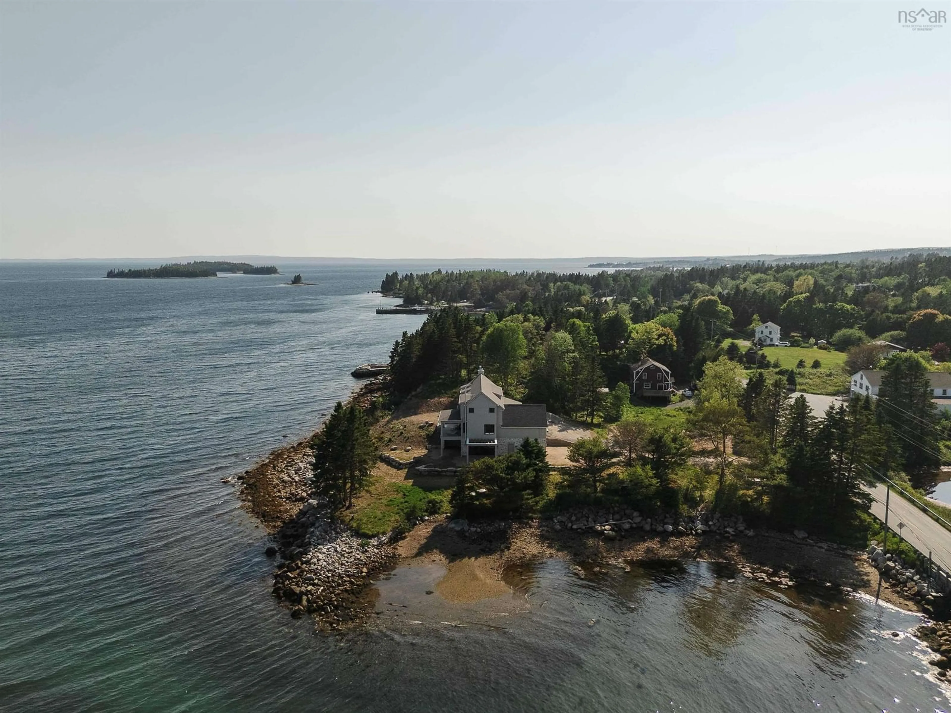 A pic from outside/outdoor area/front of a property/back of a property/a pic from drone, water/lake/river/ocean view for 7026 St Margarets Bay Rd, Boutiliers Point Nova Scotia B3Z 1W1