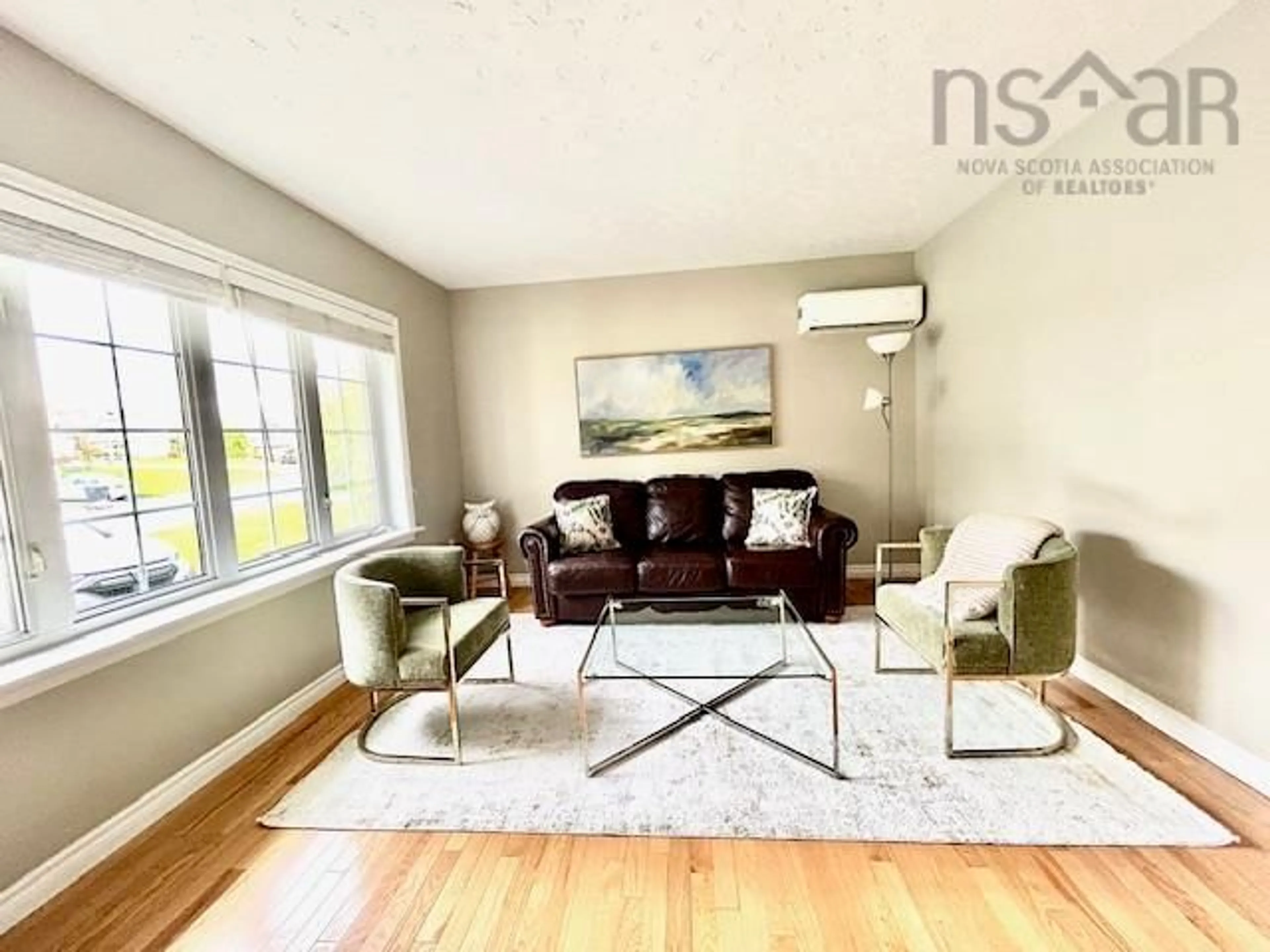 Living room with furniture, wood/laminate floor for 10 Rowan Crt, Cole Harbour Nova Scotia B2V 2S5