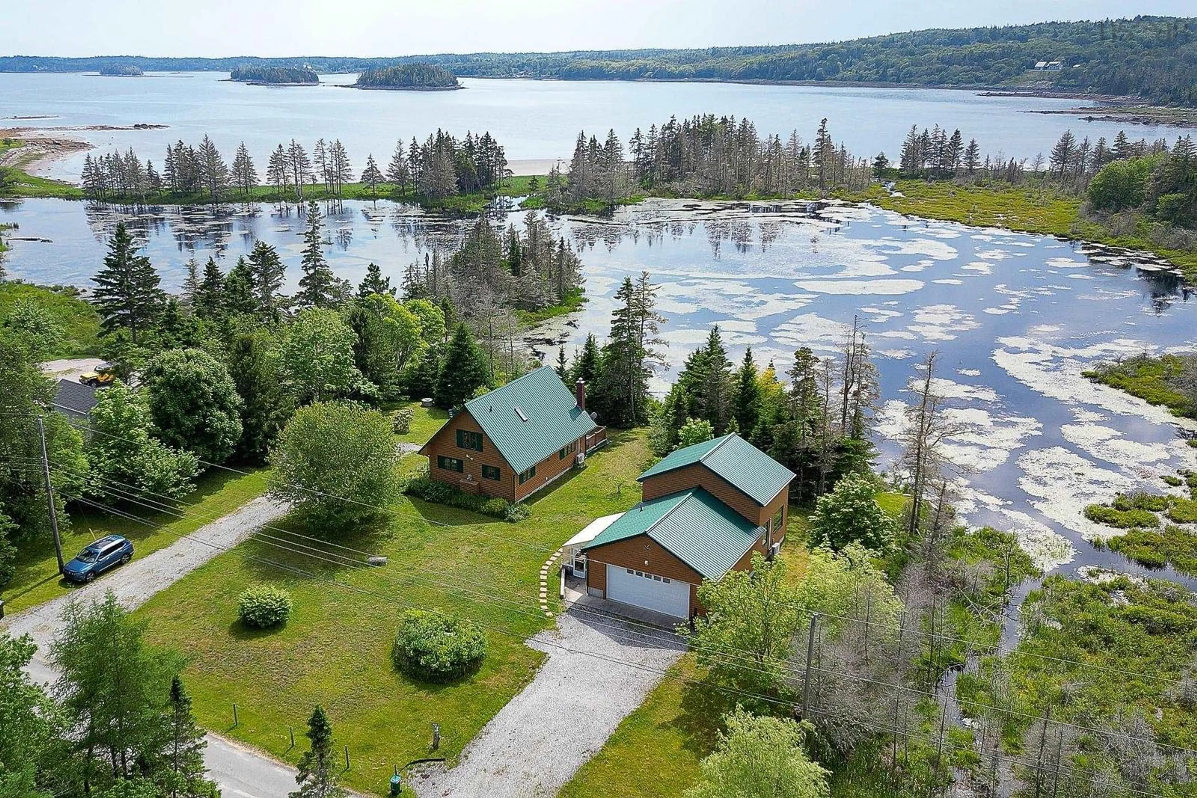 A pic from outside/outdoor area/front of a property/back of a property/a pic from drone, water/lake/river/ocean view for 148 Stevens Rd, East Green Harbour Nova Scotia B0T 1L0