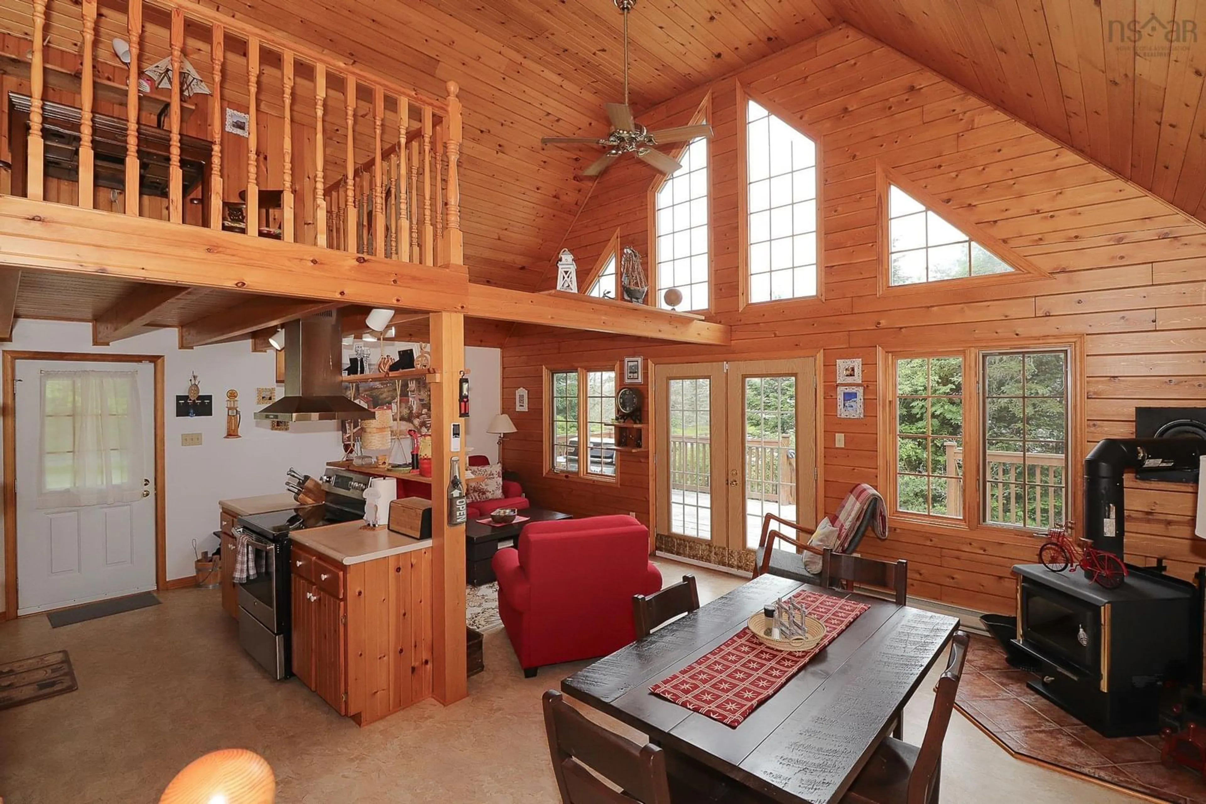 Open concept kitchen, wood/laminate floor for 148 Stevens Rd, East Green Harbour Nova Scotia B0T 1L0