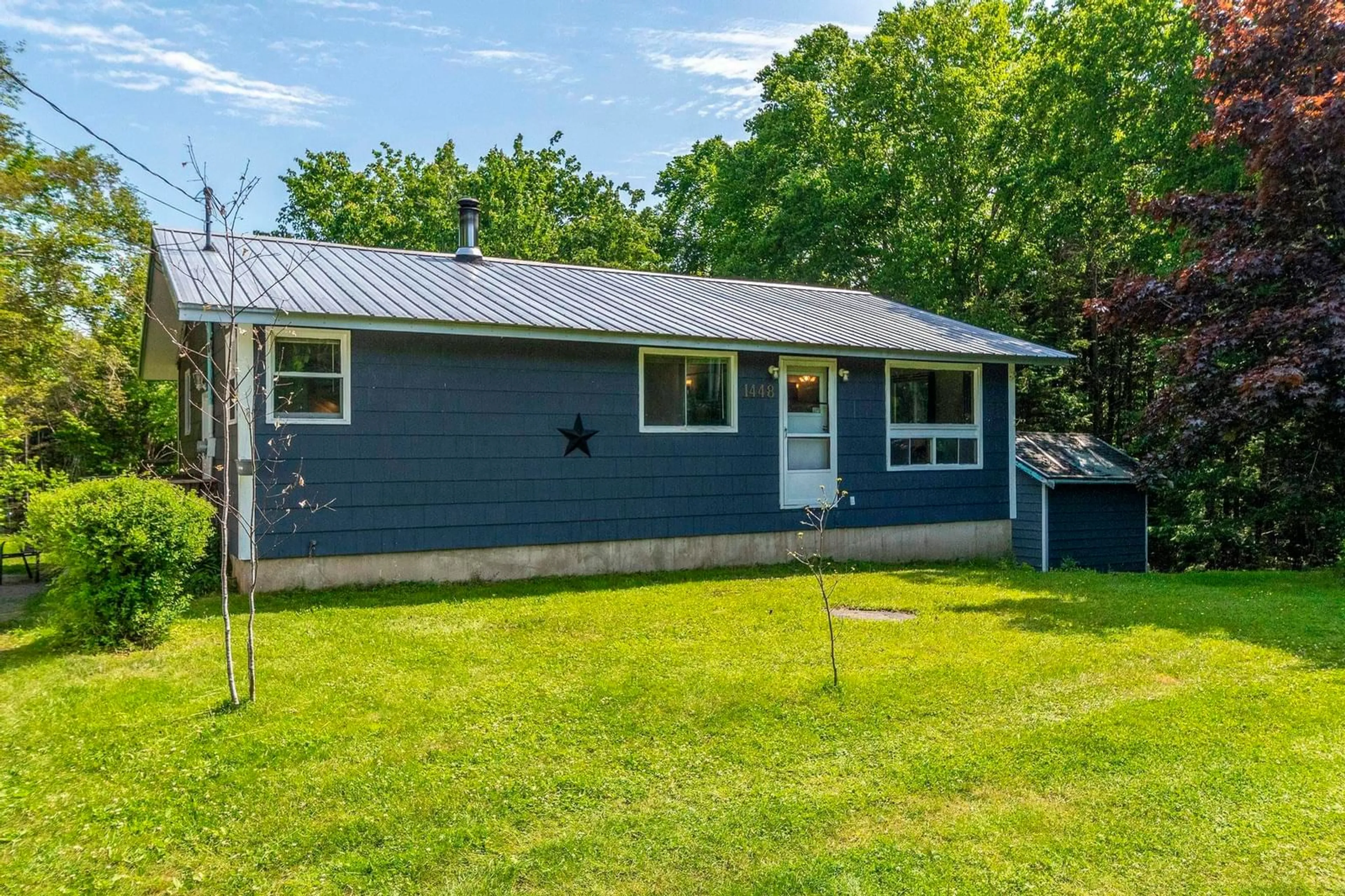 Home with vinyl exterior material, street for 1448 Beech Hill Rd, Chester Basin Nova Scotia B0J 1K0