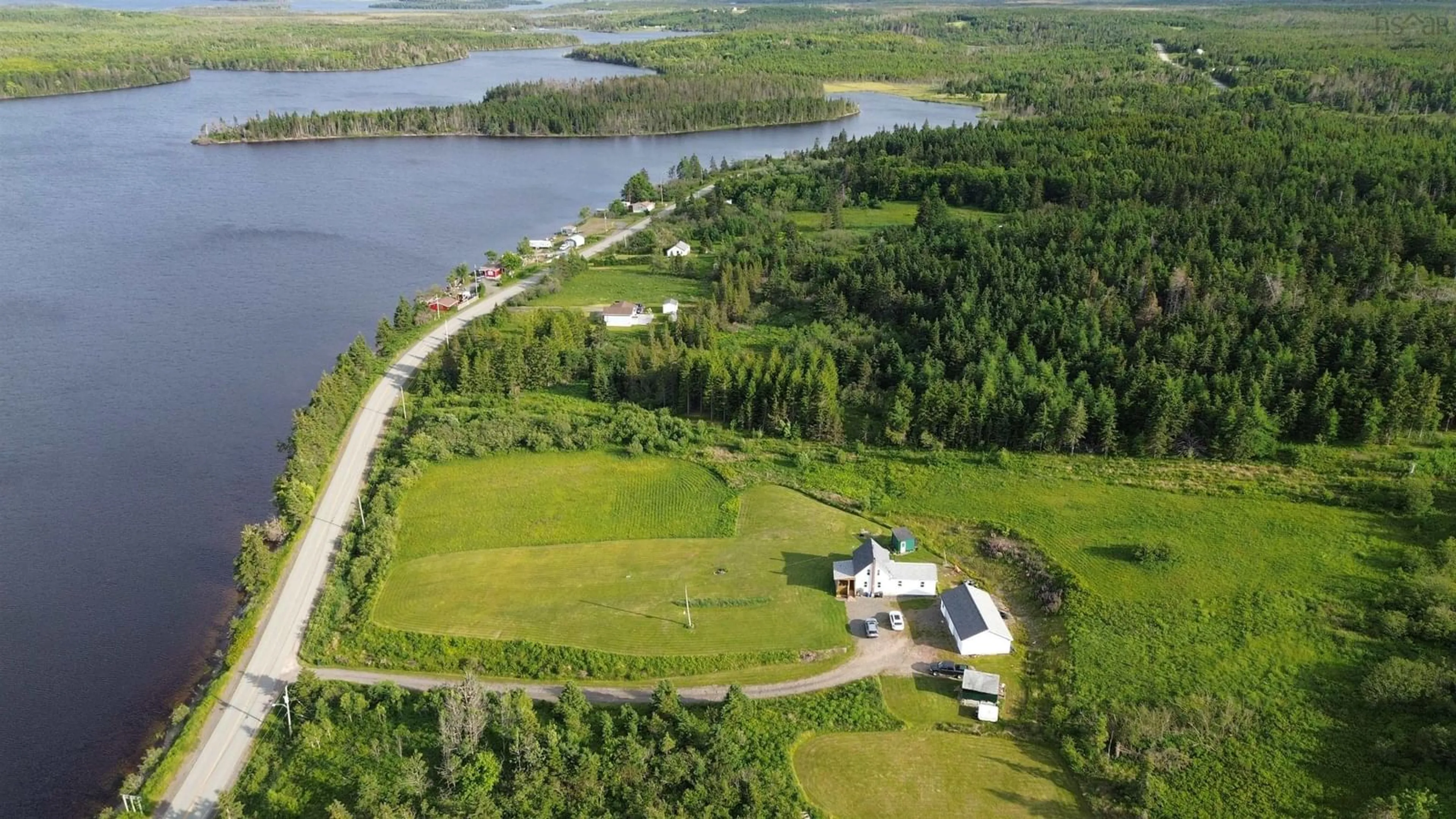 A pic from outside/outdoor area/front of a property/back of a property/a pic from drone, water/lake/river/ocean view for 922 Fourchu Rd, Gabarus Lake Nova Scotia B1K 2C9