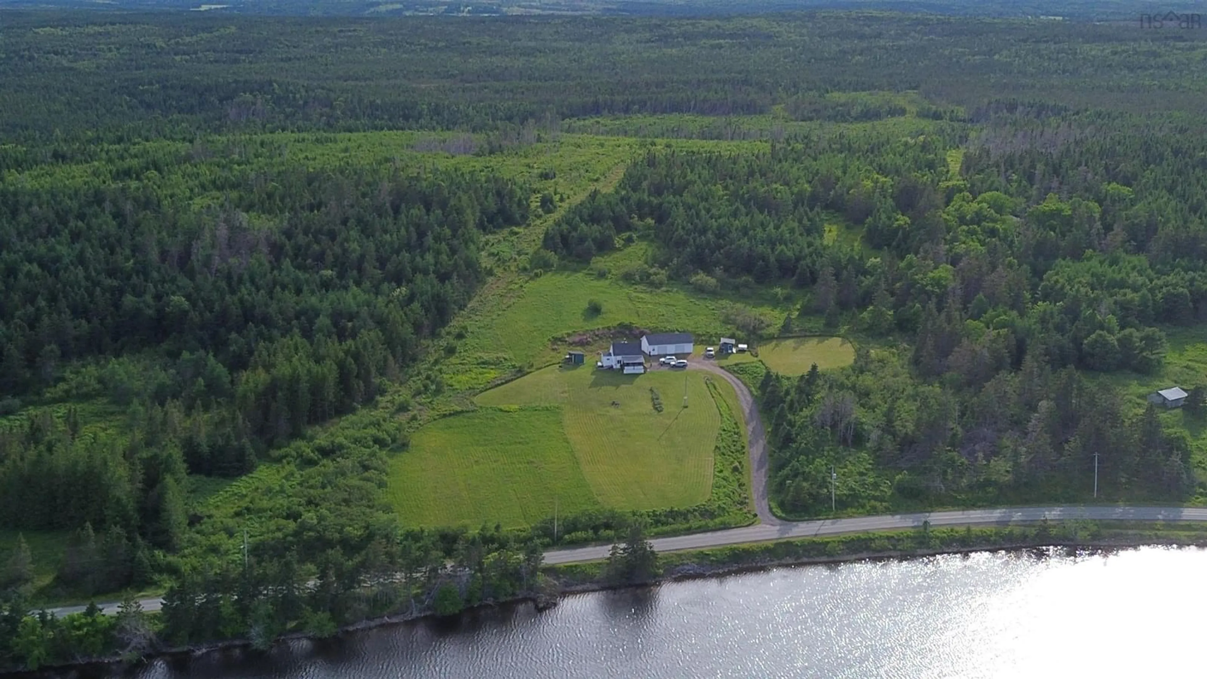 A pic from outside/outdoor area/front of a property/back of a property/a pic from drone, water/lake/river/ocean view for 922 Fourchu Rd, Gabarus Lake Nova Scotia B1K 2C9