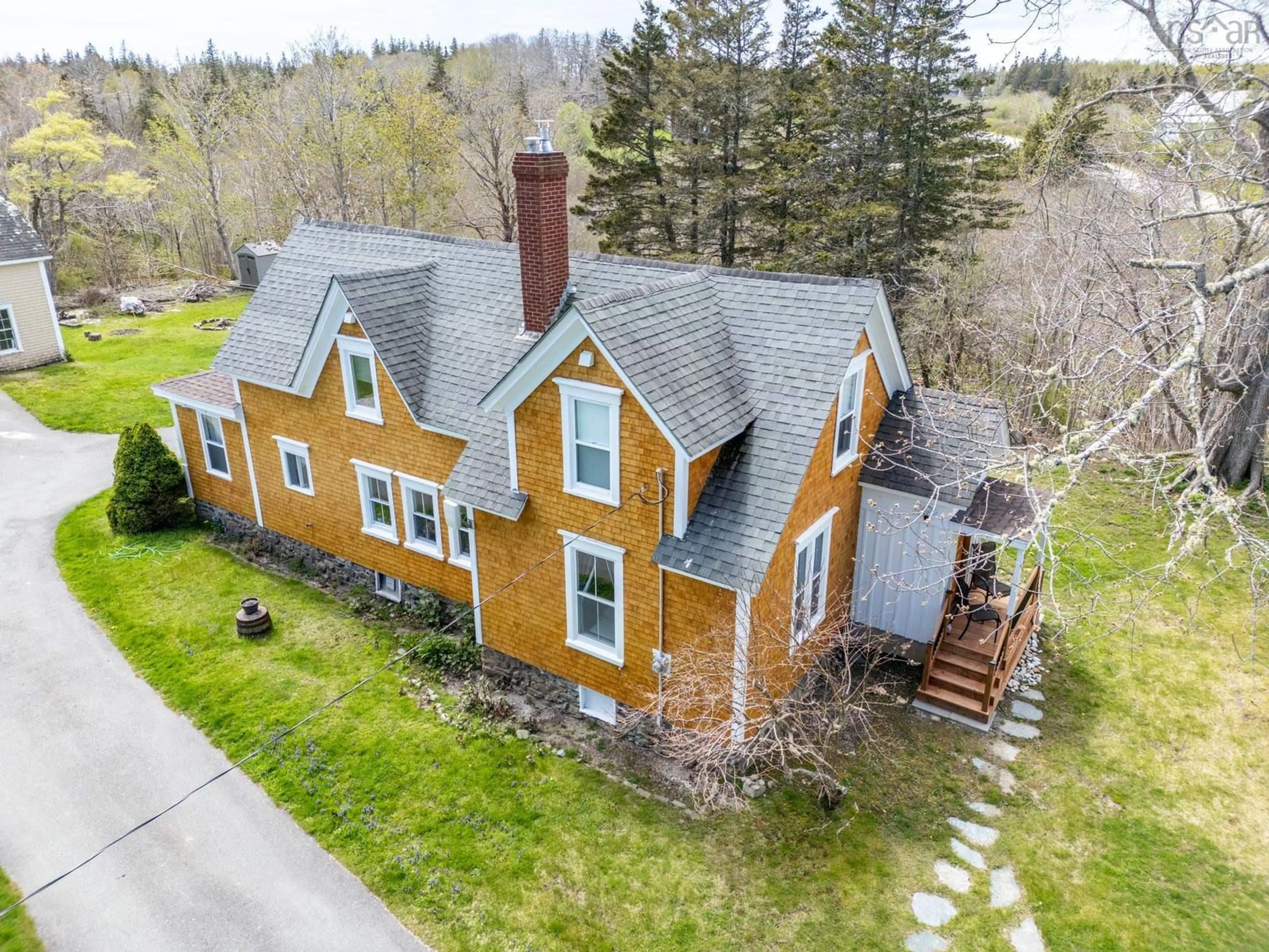 A pic from outside/outdoor area/front of a property/back of a property/a pic from drone, street for 47 Lakeside Rd, Hebron Nova Scotia B5A 5K4
