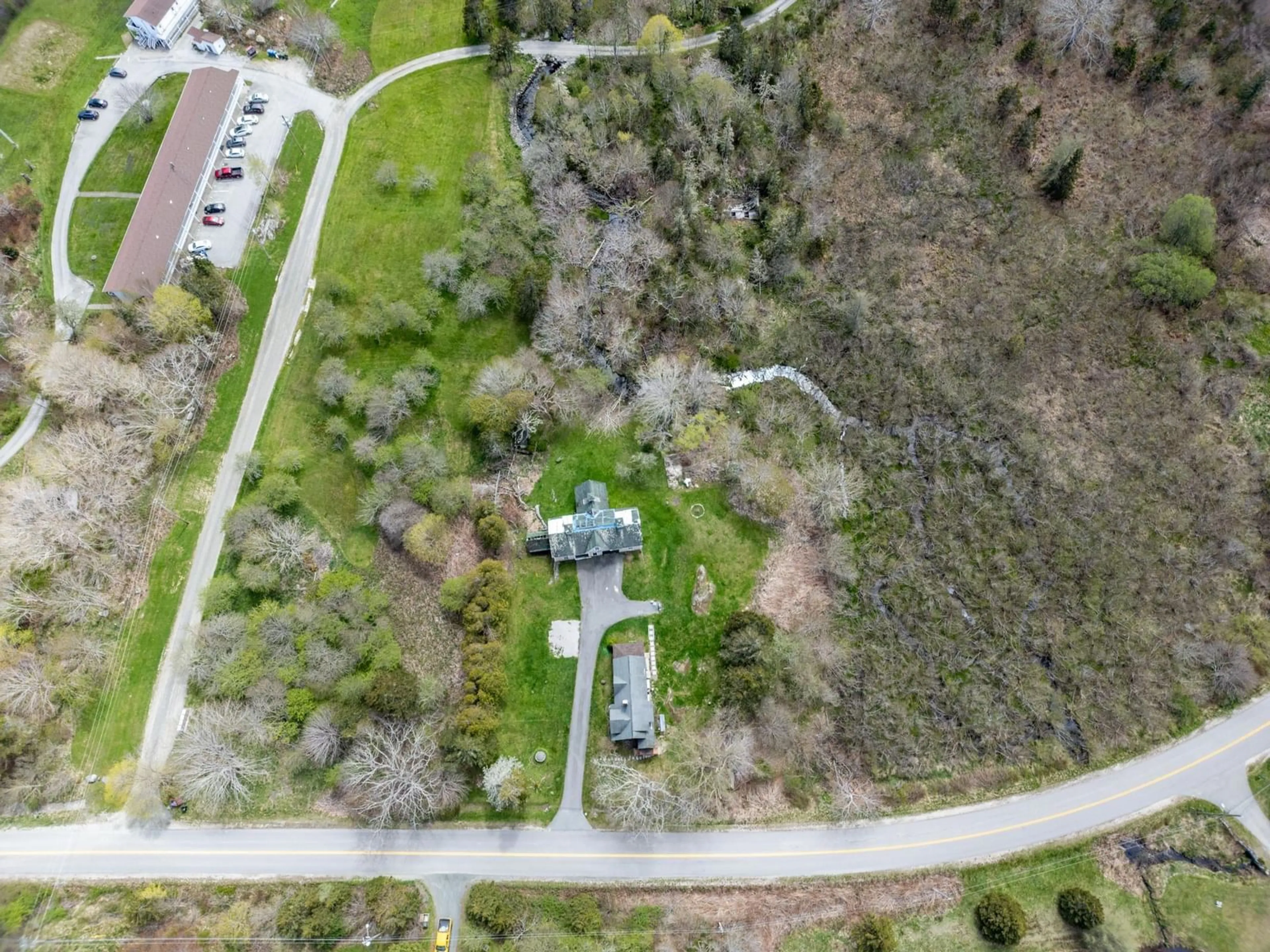 A pic from outside/outdoor area/front of a property/back of a property/a pic from drone, street for 47 Lakeside Rd, Hebron Nova Scotia B5A 5K4