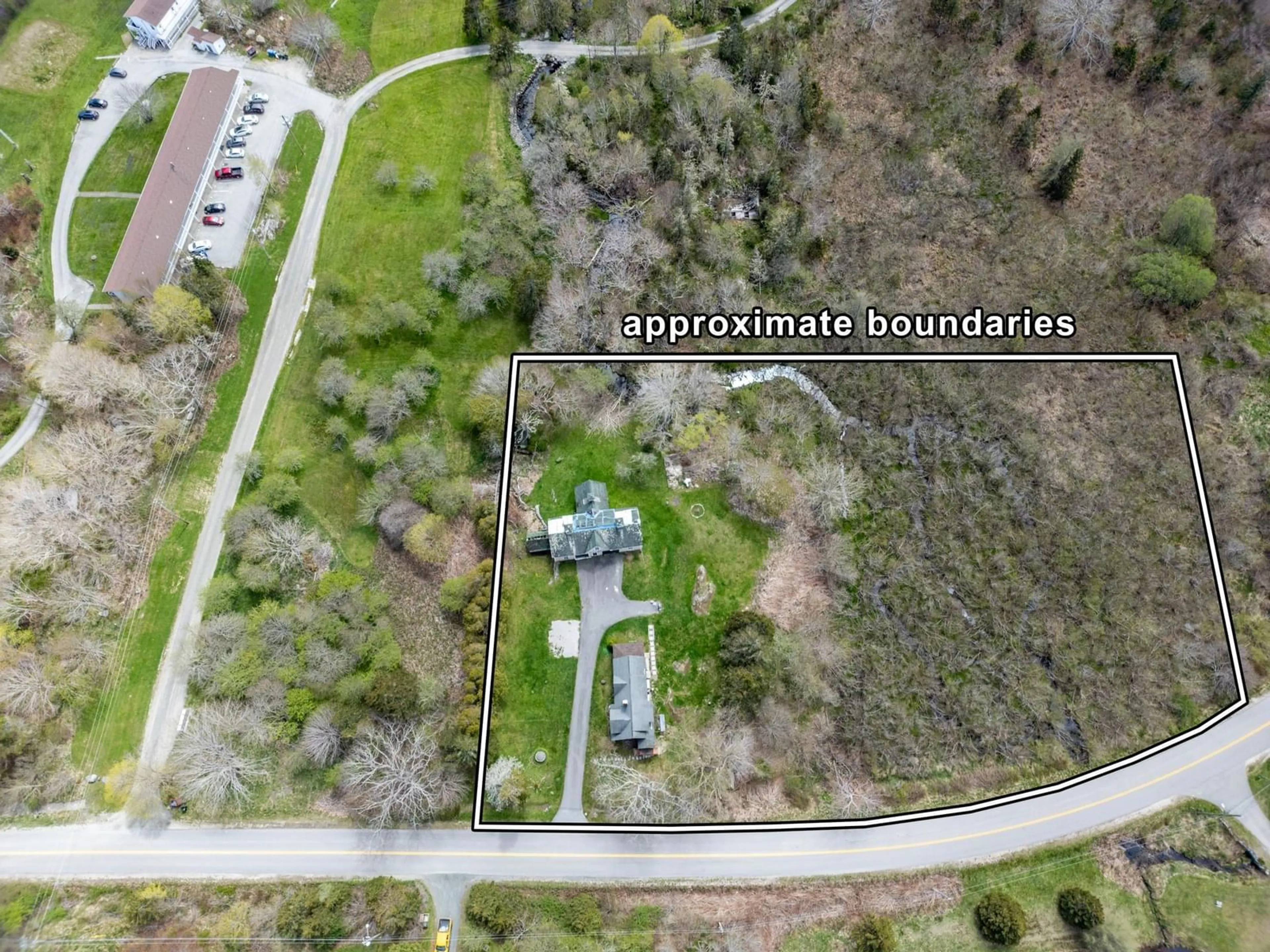 A pic from outside/outdoor area/front of a property/back of a property/a pic from drone, street for 47 Lakeside Rd, Hebron Nova Scotia B5A 5K4