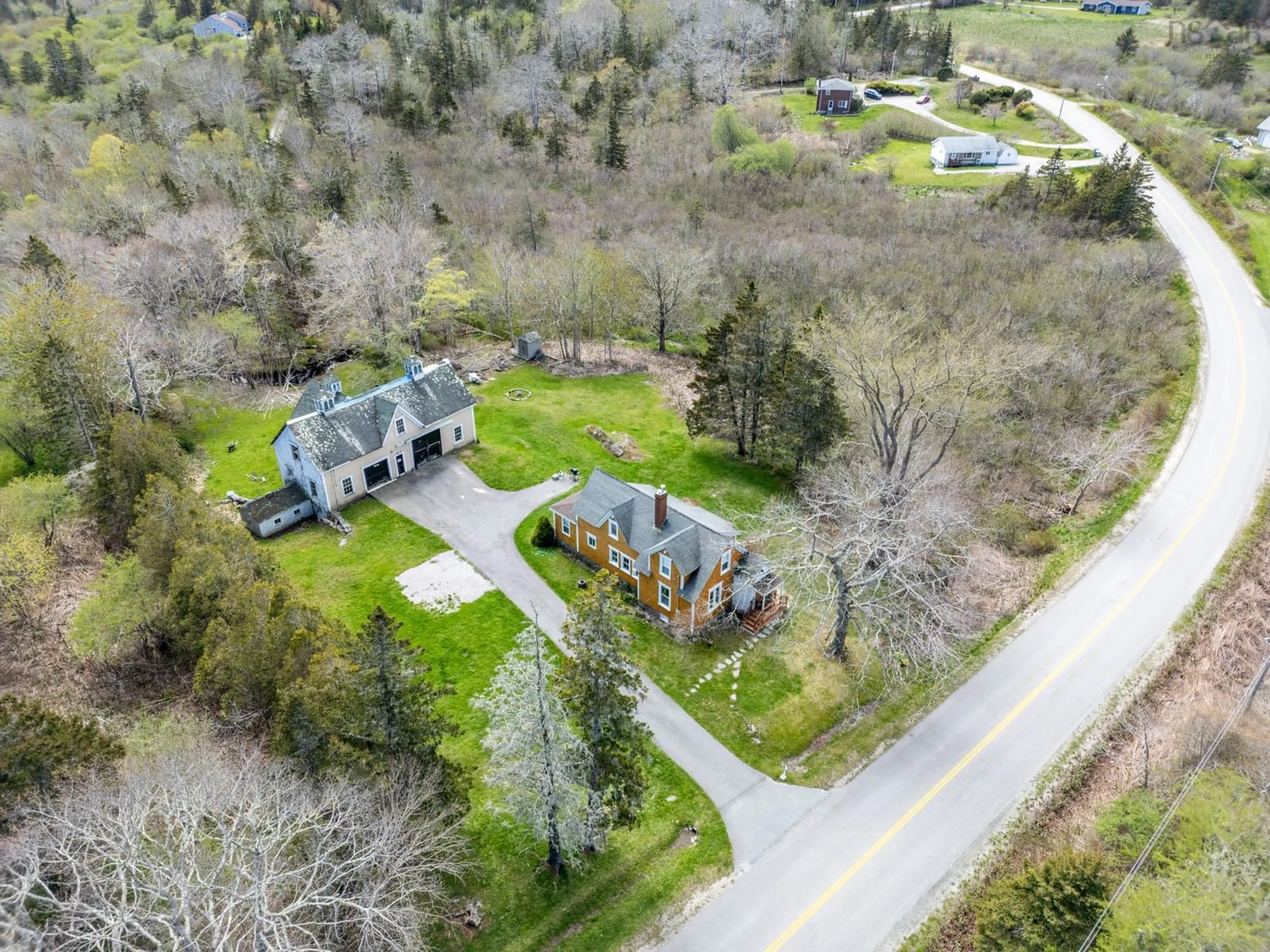 A pic from outside/outdoor area/front of a property/back of a property/a pic from drone, street for 47 Lakeside Rd, Hebron Nova Scotia B5A 5K4
