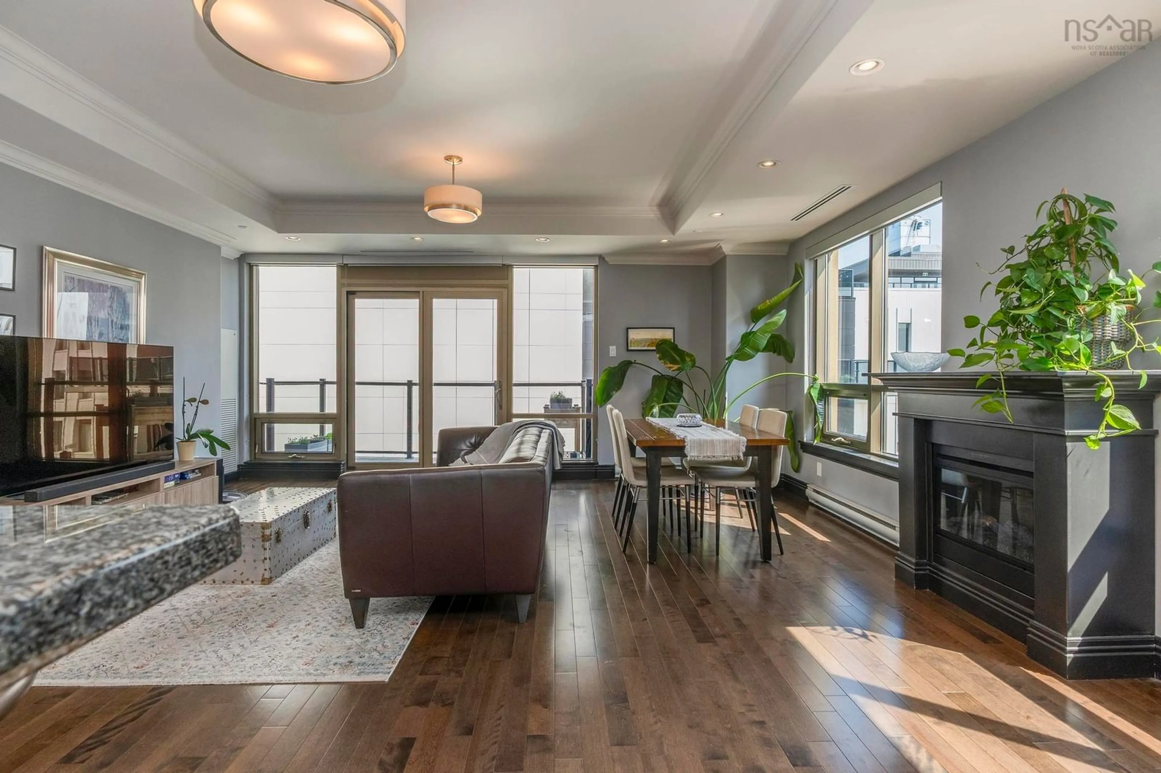 Living room with furniture, wood/laminate floor for 1445 South Park St #1105, Halifax Nova Scotia B3J 0B6