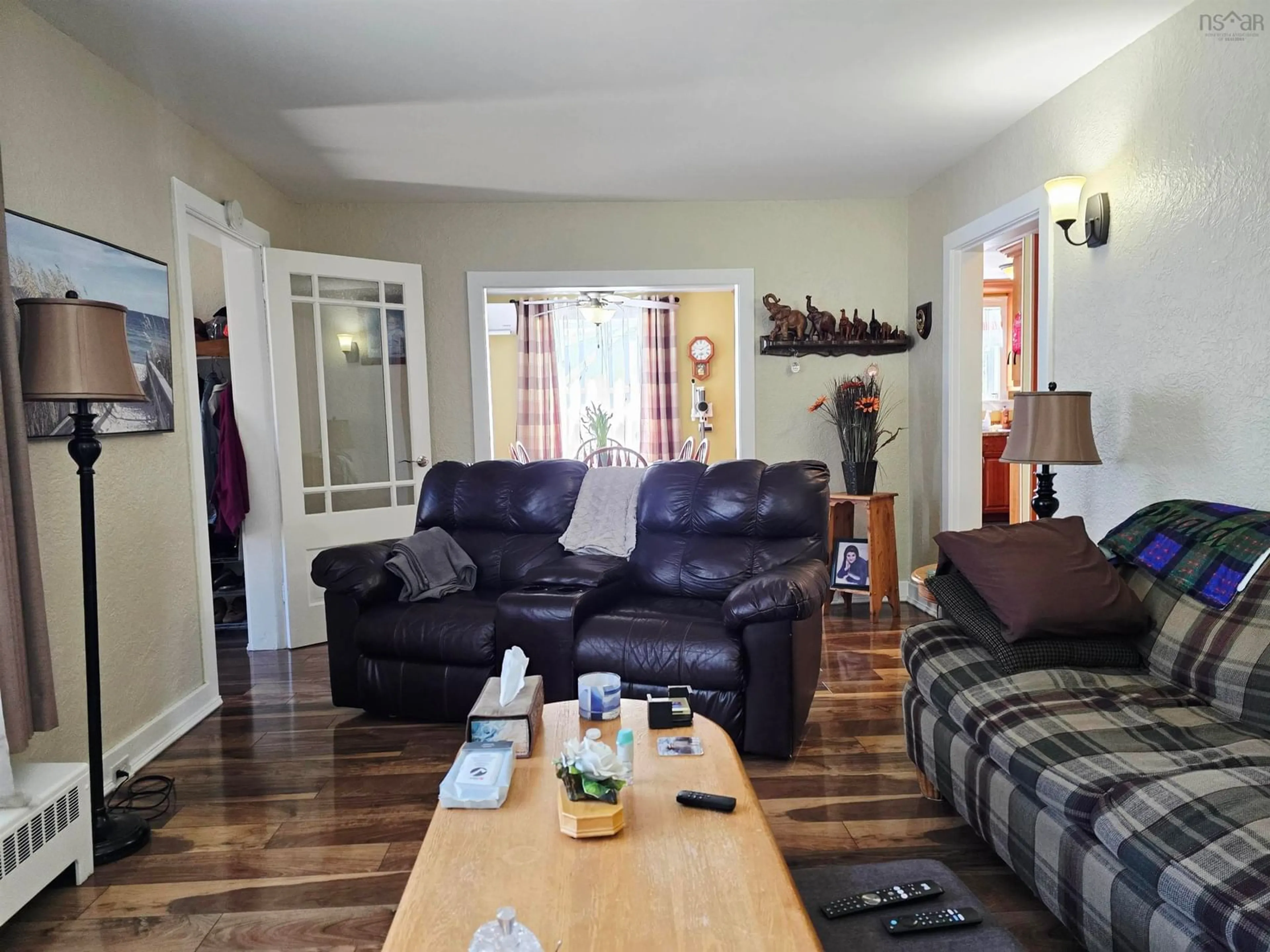 Living room with furniture, wood/laminate floor for 29 Fifth St, Trenton Nova Scotia B0K 1X0