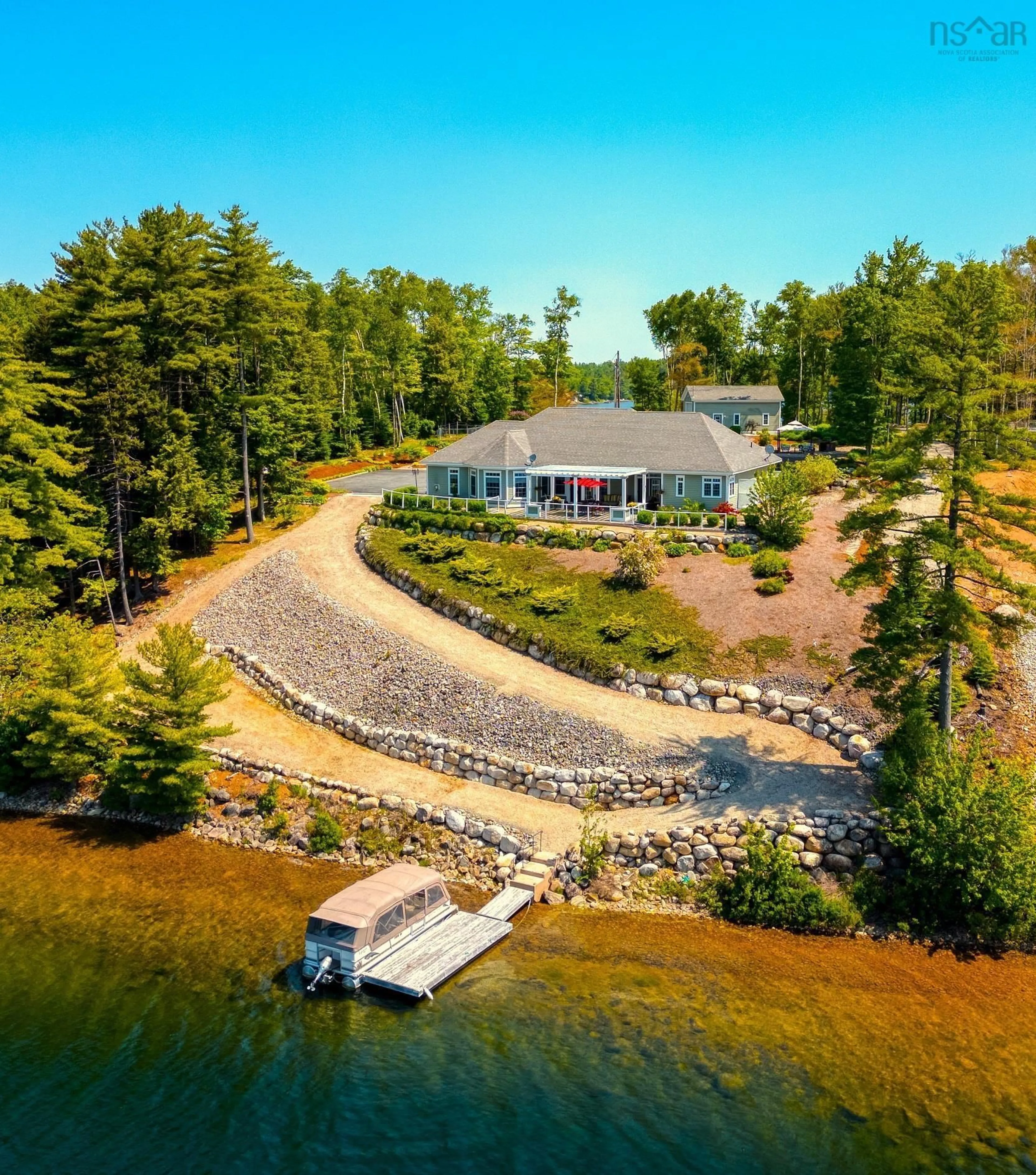 A pic from outside/outdoor area/front of a property/back of a property/a pic from drone, water/lake/river/ocean view for 409 Aulenback Point Rd, Sweetland Nova Scotia B0J 1E0
