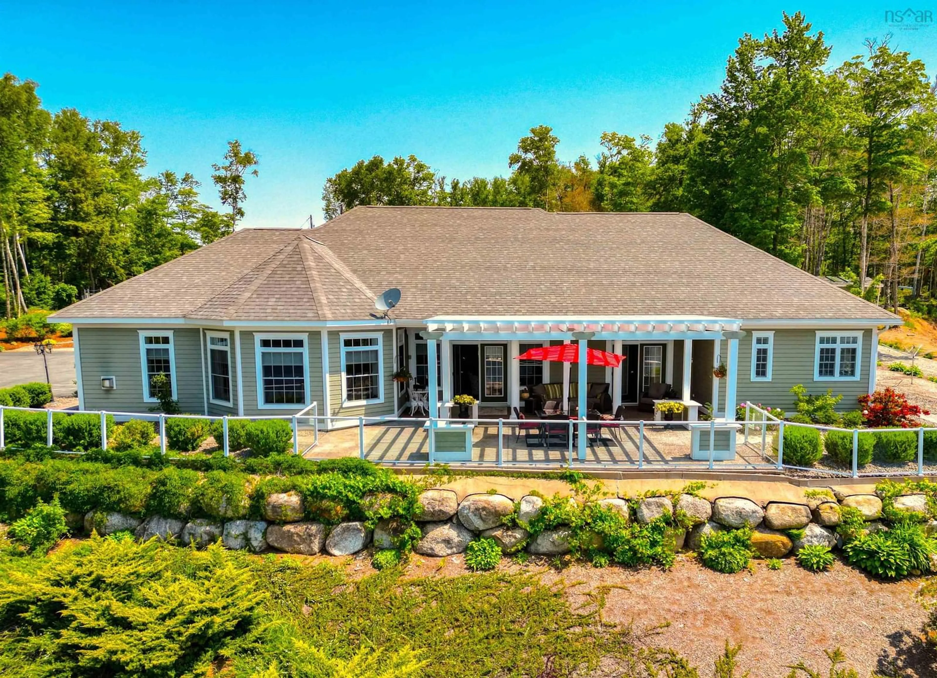A pic from outside/outdoor area/front of a property/back of a property/a pic from drone, water/lake/river/ocean view for 409 Aulenback Point Rd, Sweetland Nova Scotia B0J 1E0