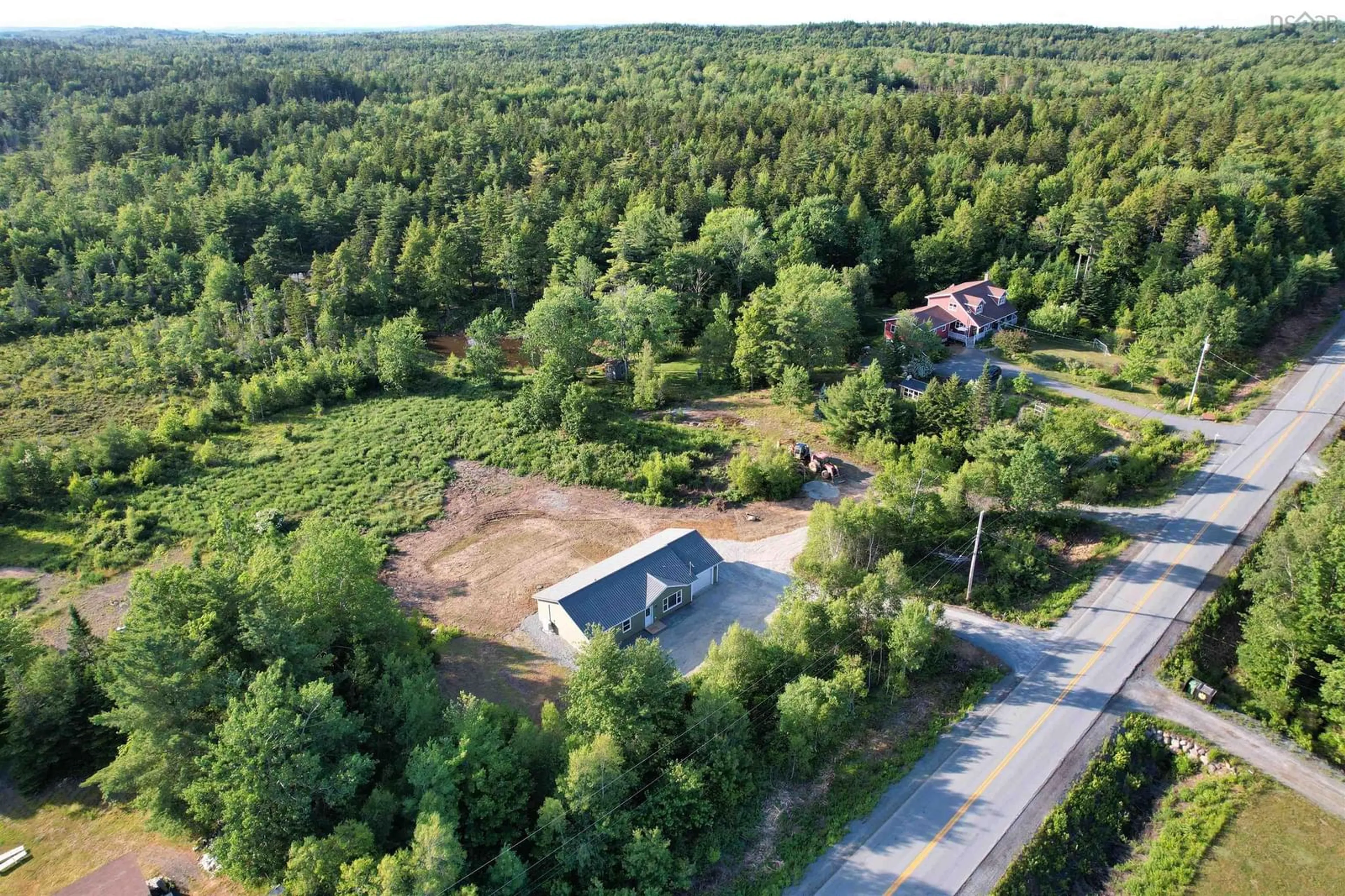 A pic from outside/outdoor area/front of a property/back of a property/a pic from drone, forest/trees view for 1339 Conquerall Rd, Conquerall Mills Nova Scotia B4V 6C7