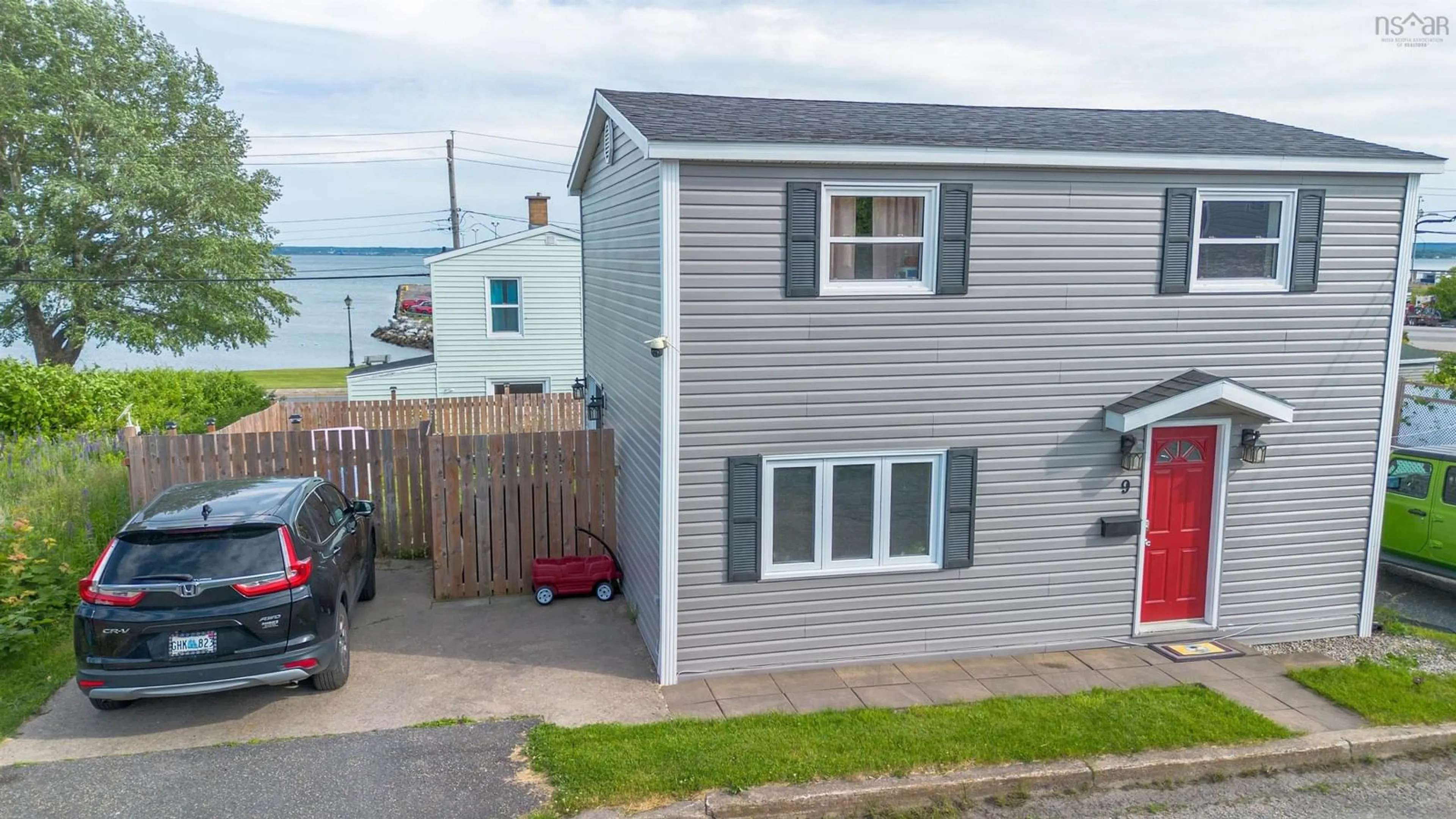 A pic from outside/outdoor area/front of a property/back of a property/a pic from drone, street for 9 Cogan St, North Sydney Nova Scotia B2A 3A7