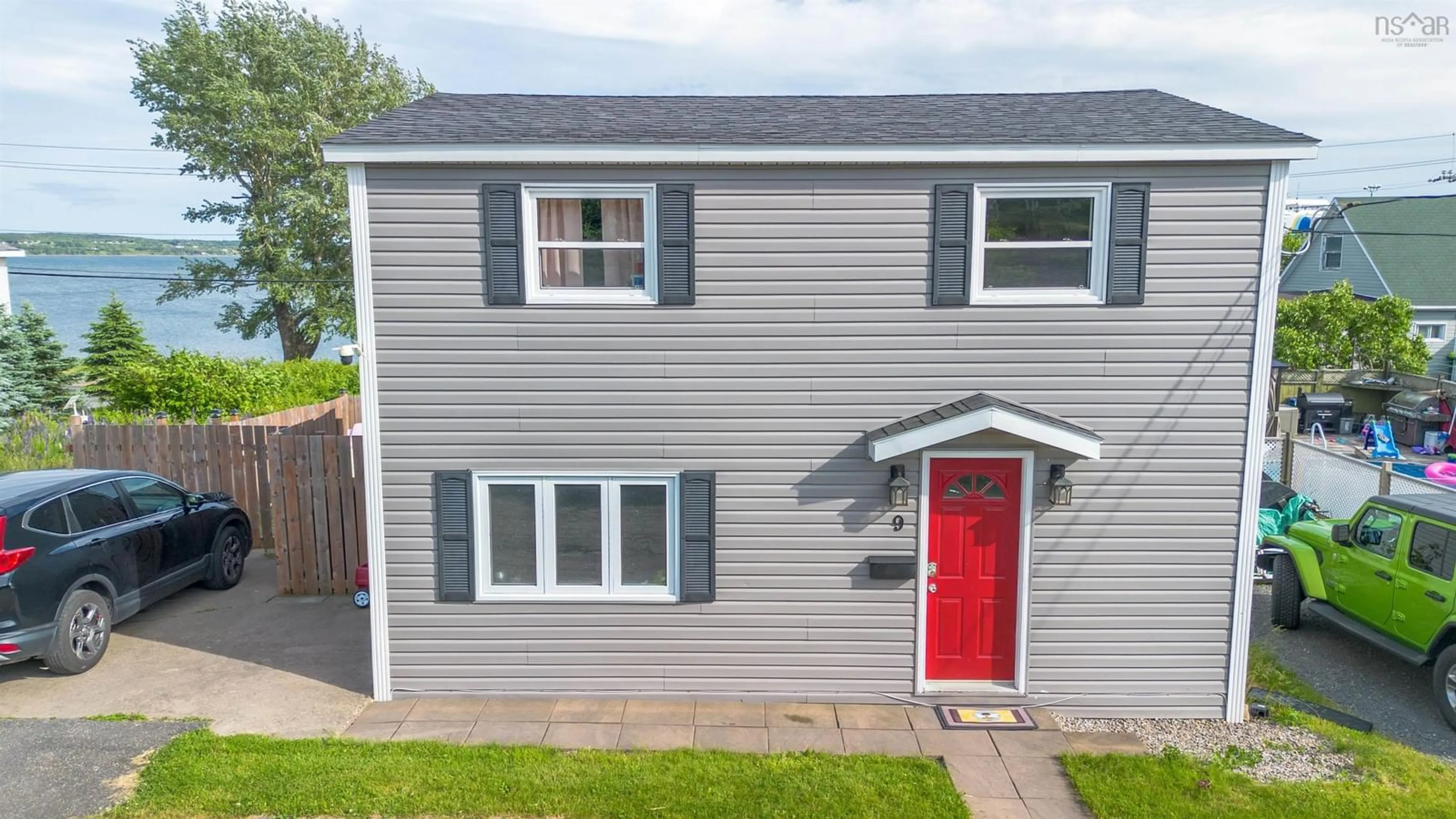 Home with vinyl exterior material, street for 9 Cogan St, North Sydney Nova Scotia B2A 3A7