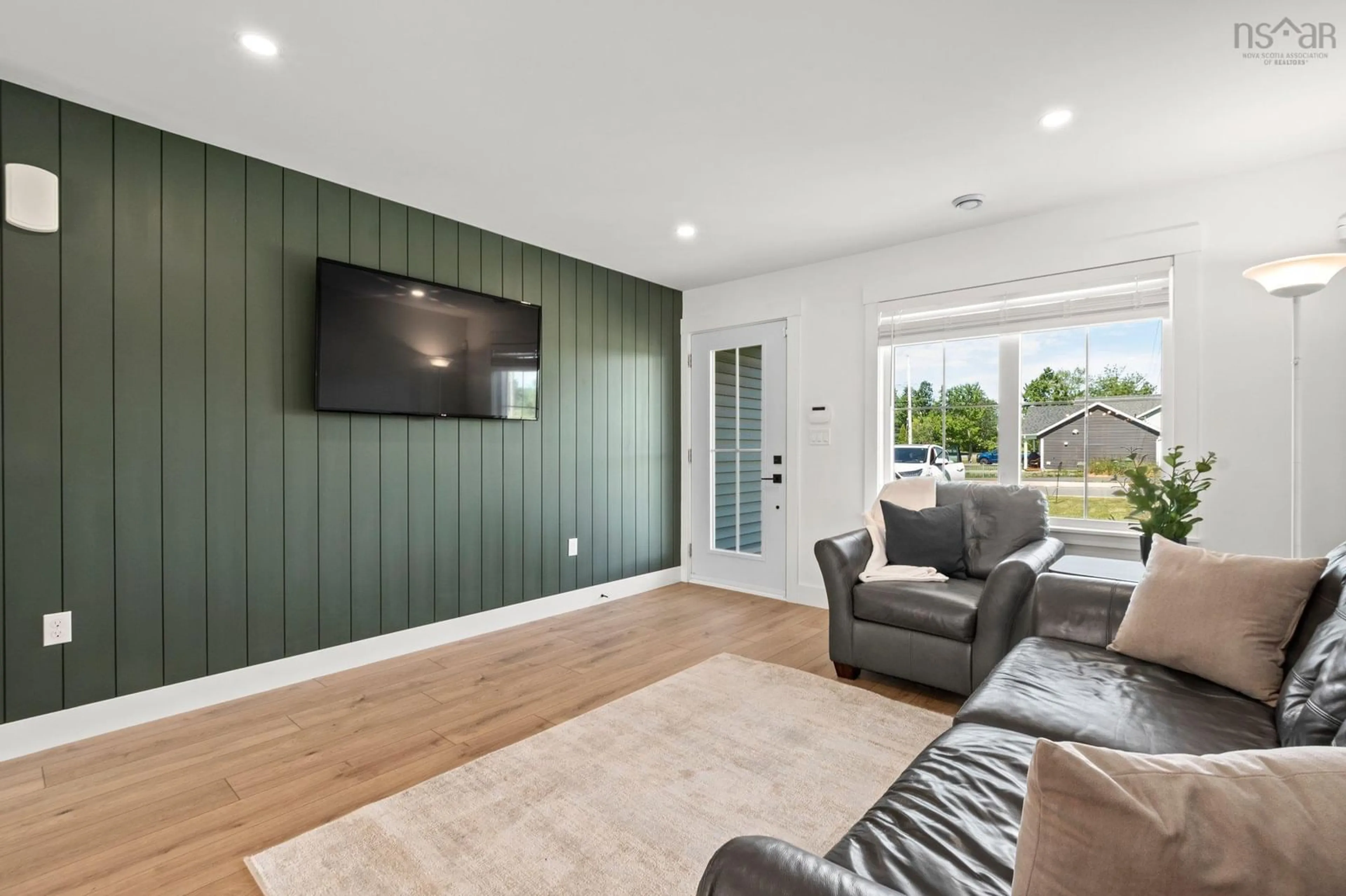 Living room with furniture, wood/laminate floor for 22 Mariah Dr, Lantz Nova Scotia B2S 0G6