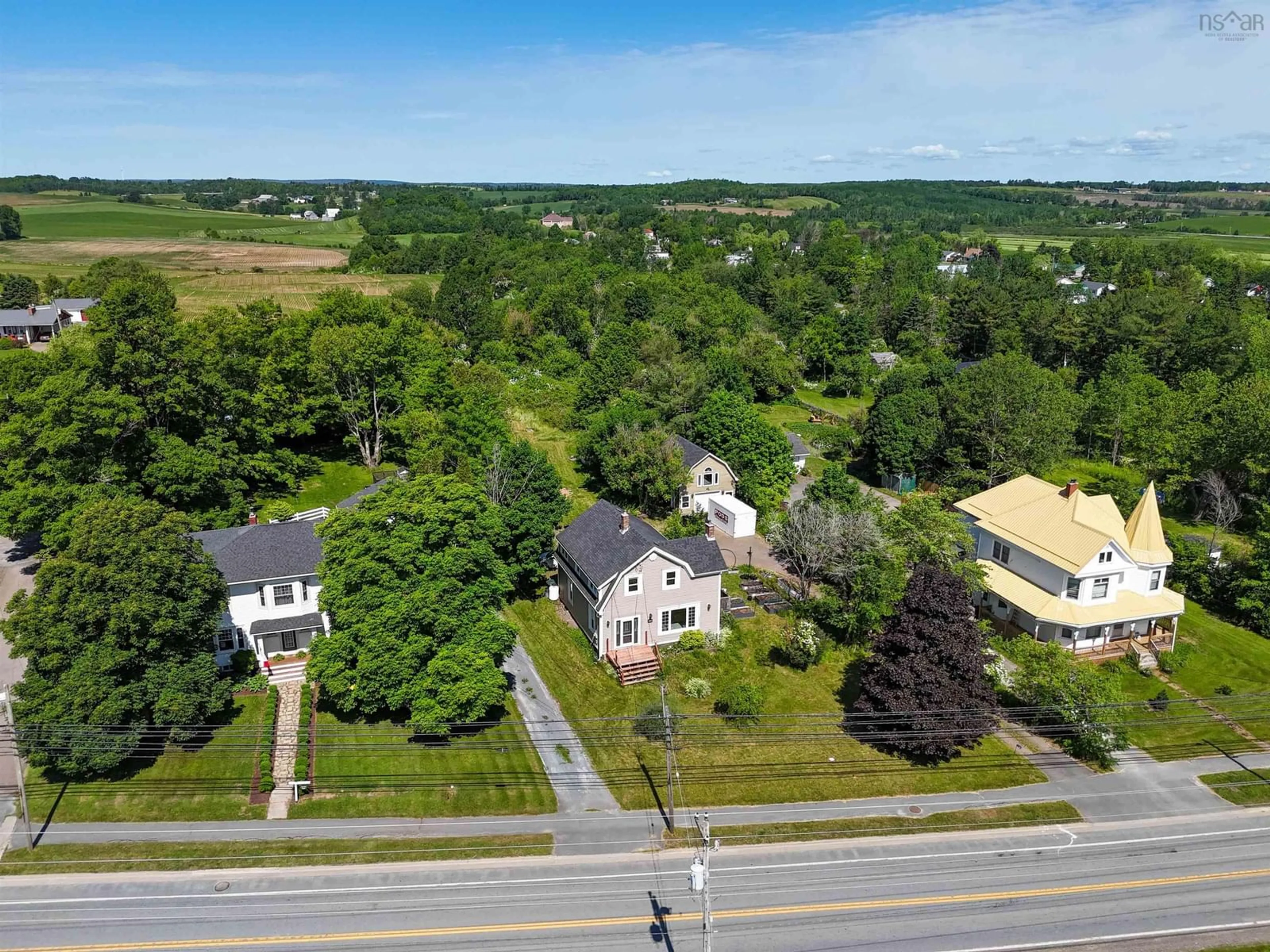 A pic from outside/outdoor area/front of a property/back of a property/a pic from drone, street for 2780 Highway 2, Shubenacadie Nova Scotia B0N 2H0