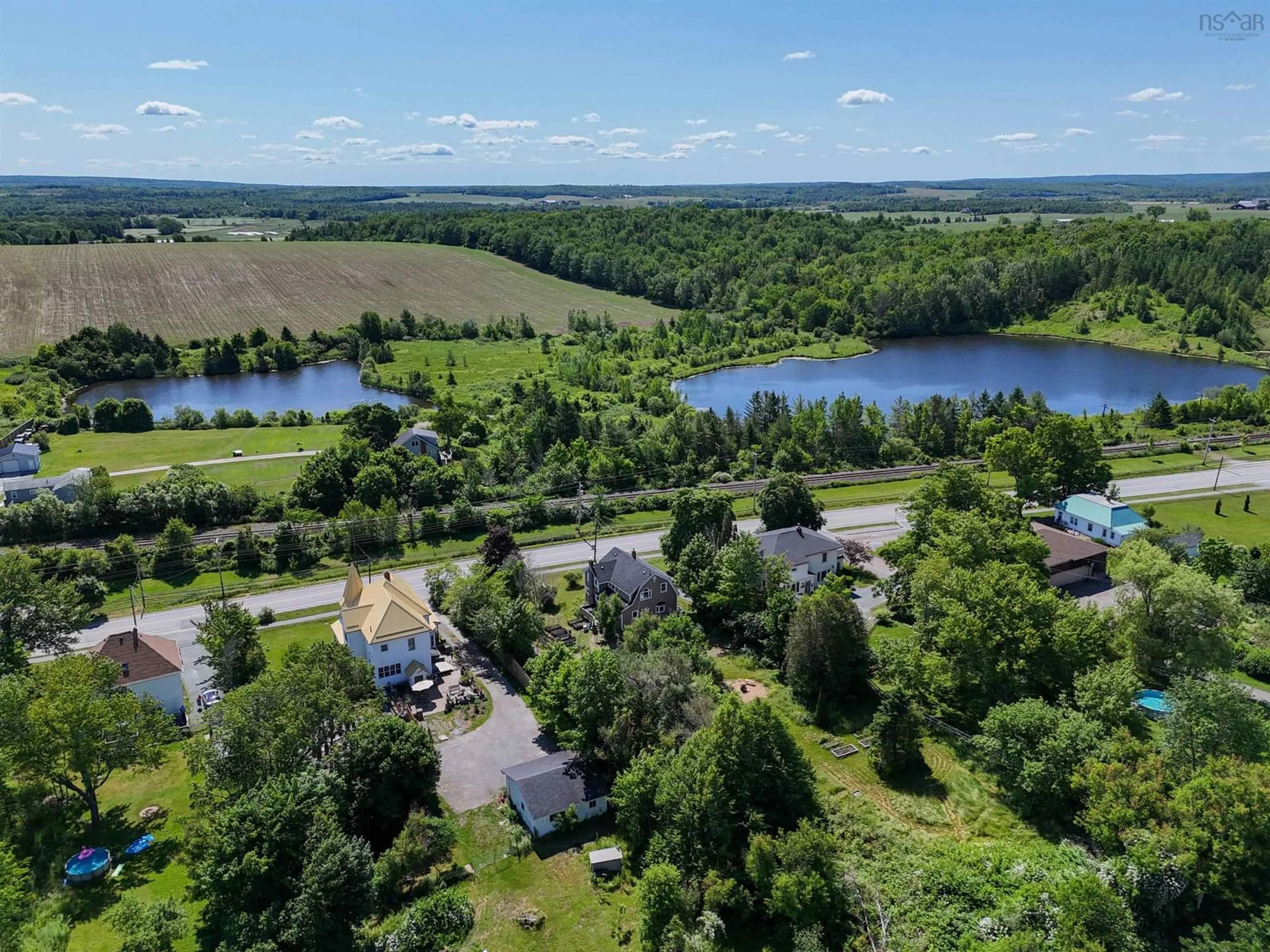 A pic from outside/outdoor area/front of a property/back of a property/a pic from drone, water/lake/river/ocean view for 2780 Highway 2, Shubenacadie Nova Scotia B0N 2H0