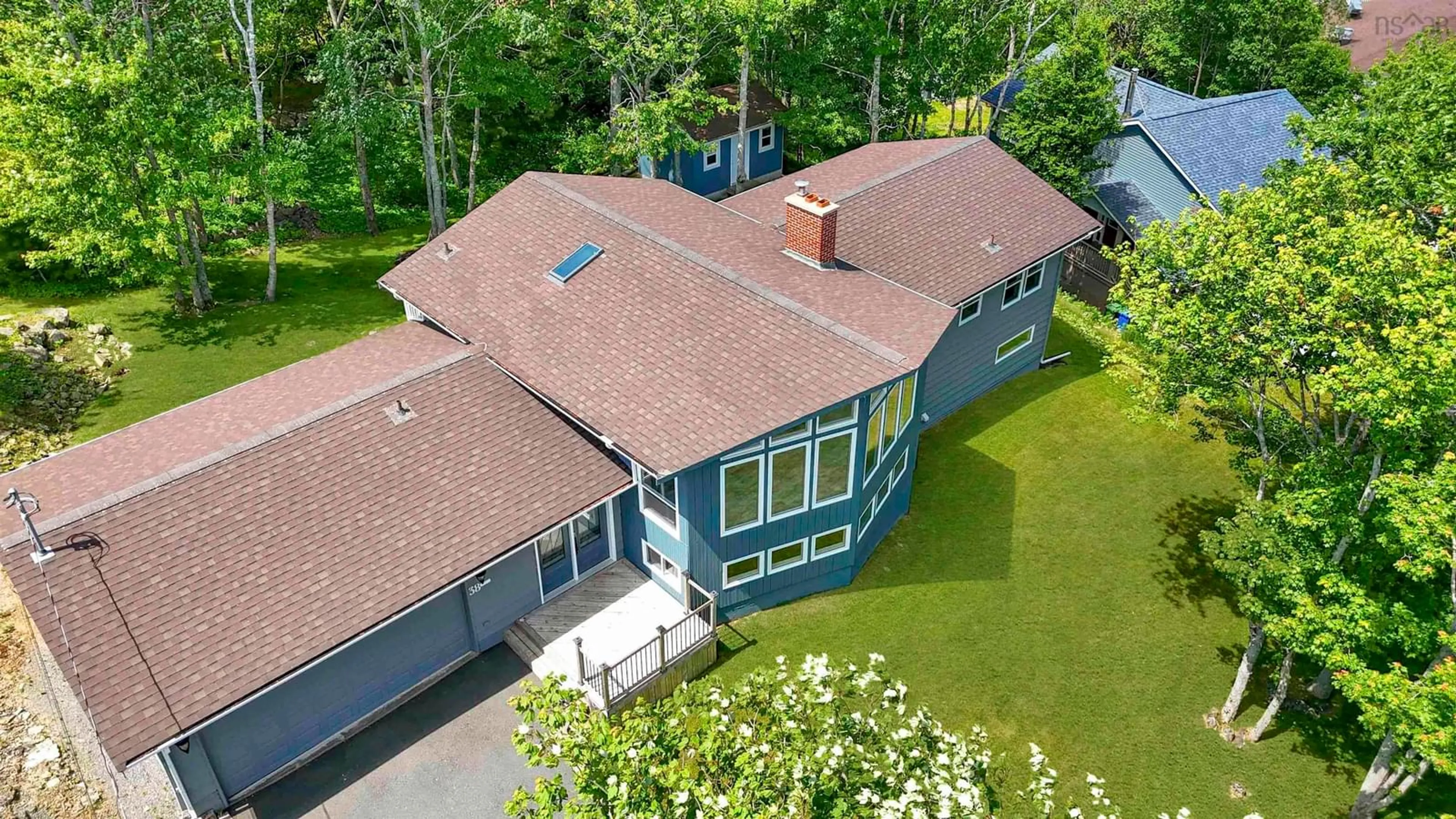 A pic from outside/outdoor area/front of a property/back of a property/a pic from drone, unknown for 38 Broadholme Lane, Halifax Nova Scotia B3M 3C1