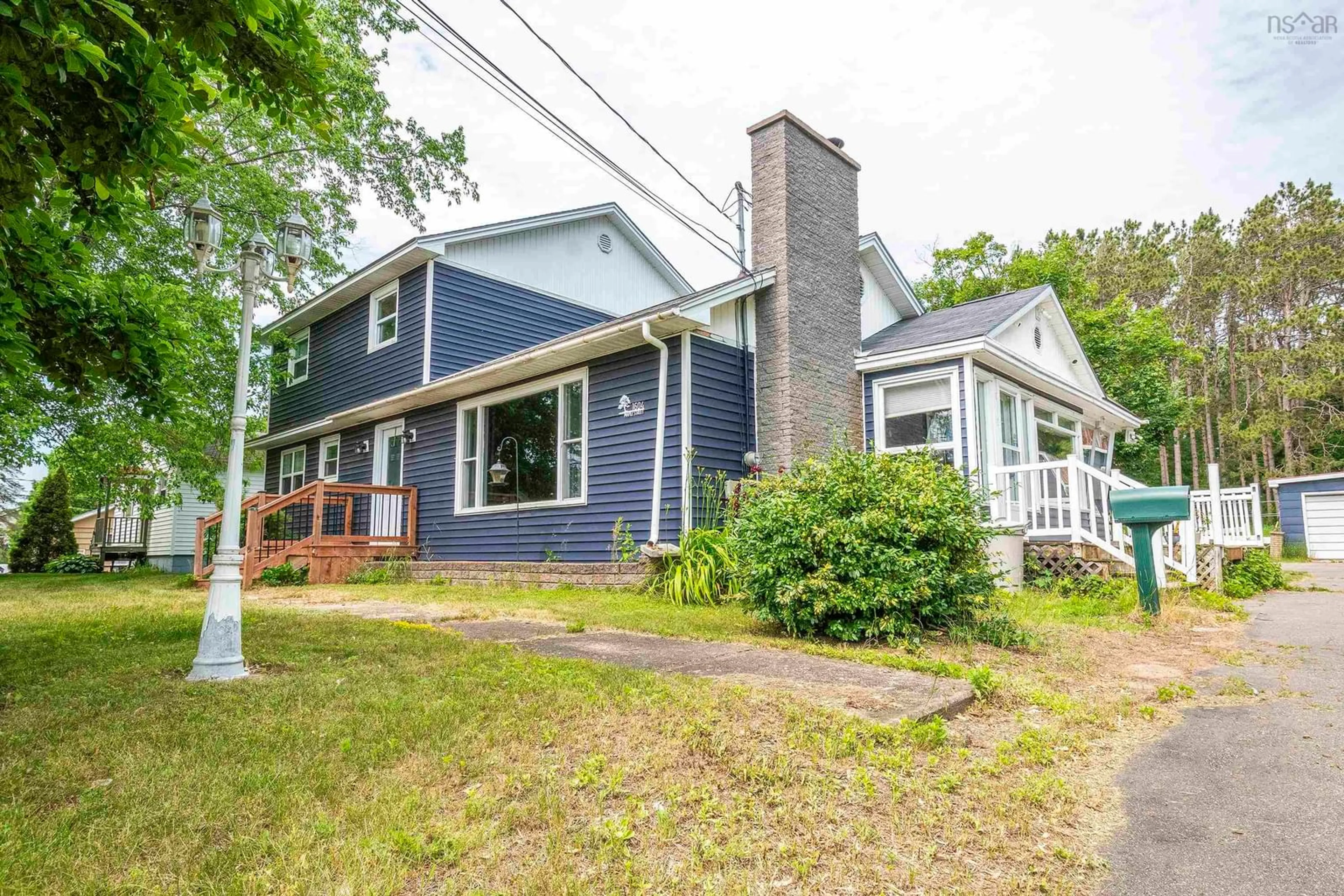 Home with vinyl exterior material, street for 1604 Maple St, Kingston Nova Scotia B0P 1R0