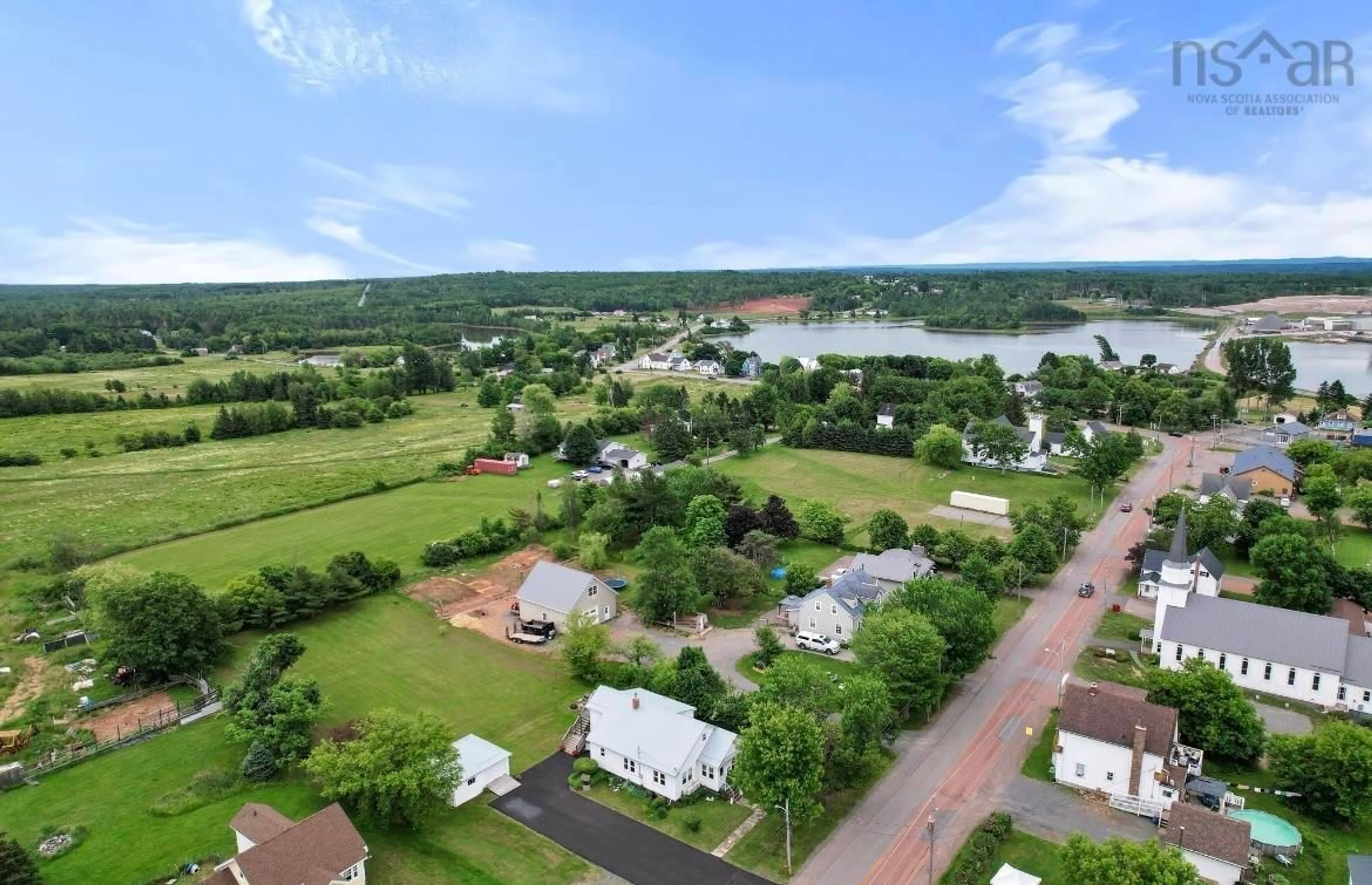 A pic from outside/outdoor area/front of a property/back of a property/a pic from drone, water/lake/river/ocean view for 108 Church St, Pugwash Nova Scotia B0K 1L0