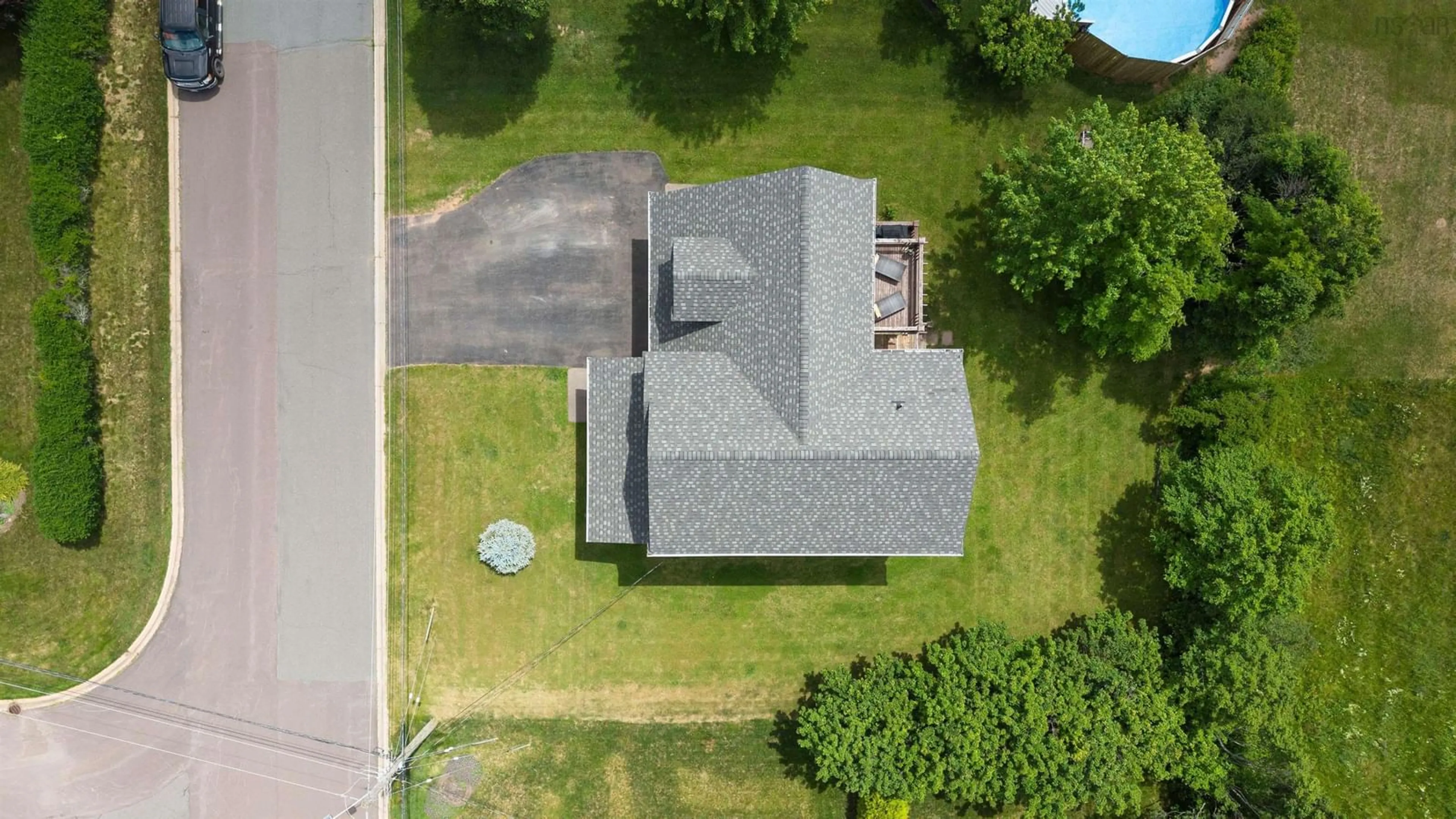 A pic from outside/outdoor area/front of a property/back of a property/a pic from drone, street for 33 Abbey Rd, Amherst Nova Scotia B4H 4V9