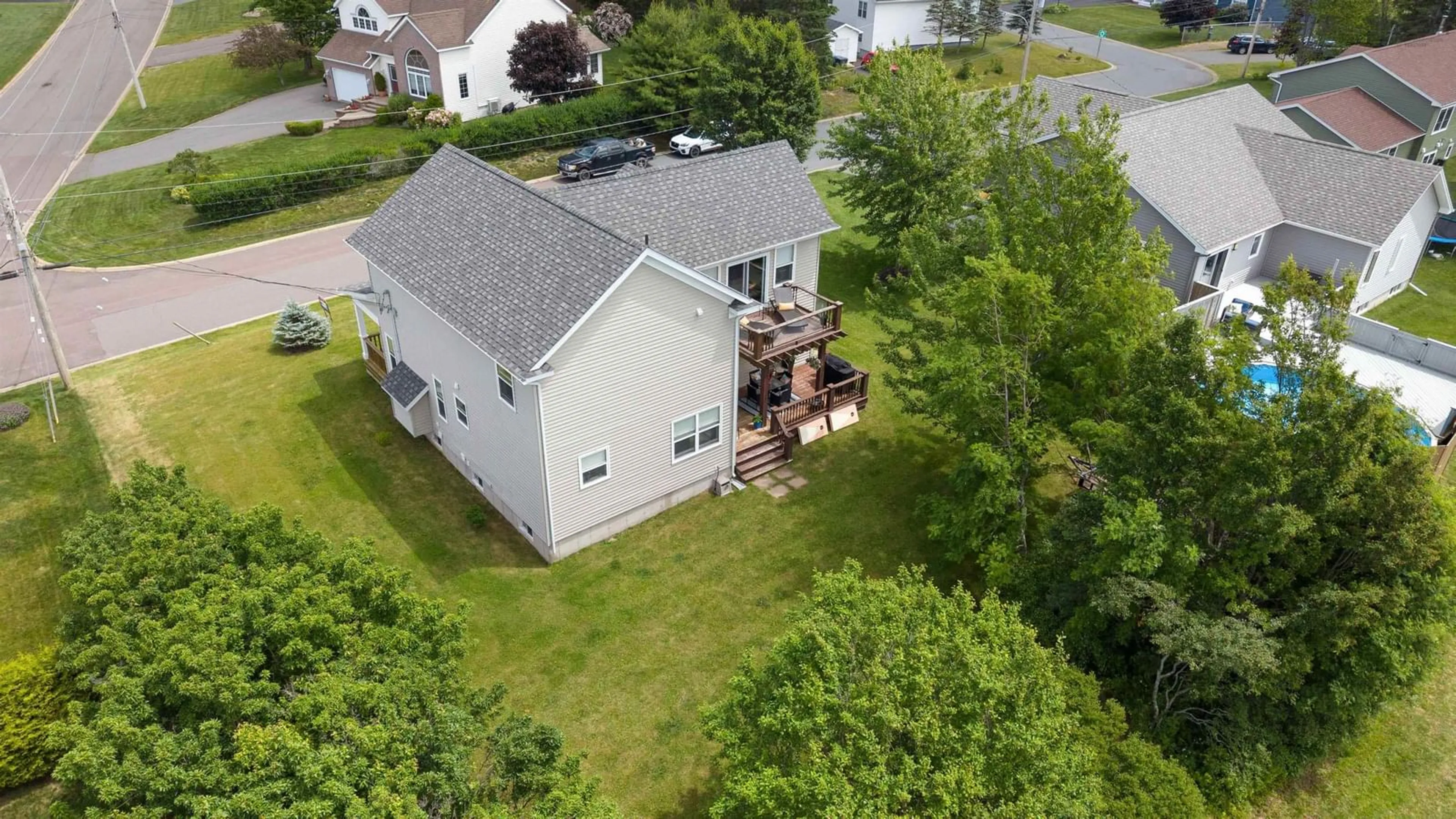 A pic from outside/outdoor area/front of a property/back of a property/a pic from drone, water/lake/river/ocean view for 33 Abbey Rd, Amherst Nova Scotia B4H 4V9