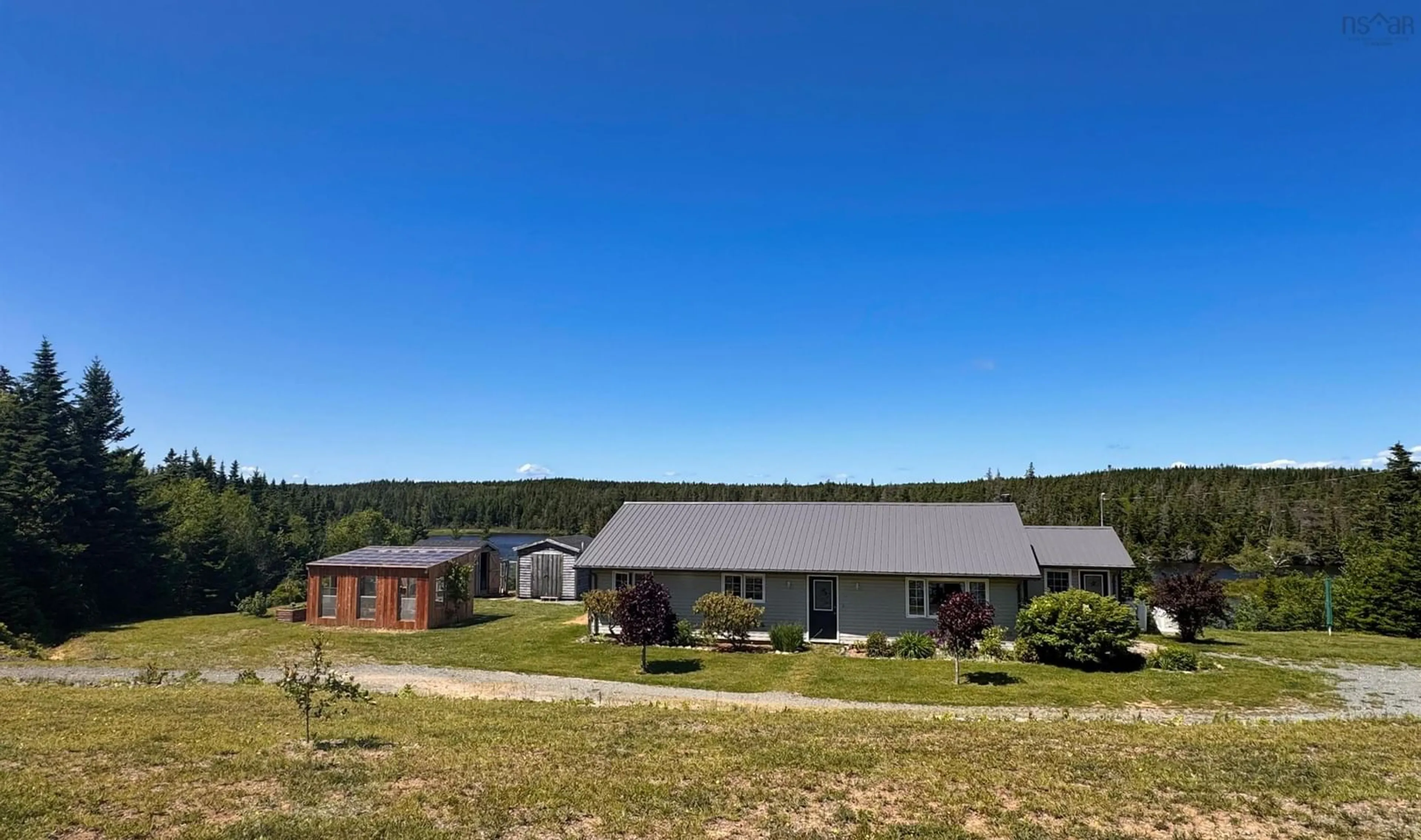 A pic from outside/outdoor area/front of a property/back of a property/a pic from drone, mountain view for 1757 St Peters Fourchu Rd, Grand River Nova Scotia B0E 1M0