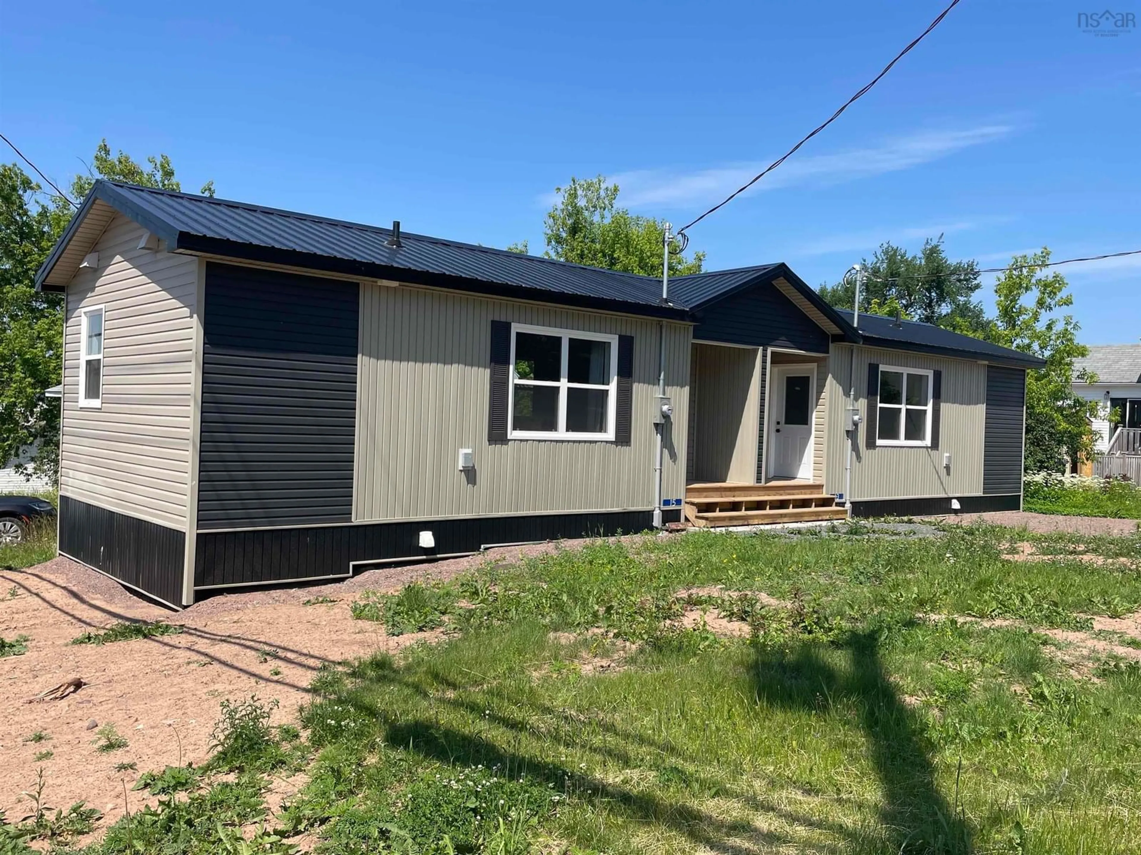Home with vinyl exterior material, street for 13-15 Mechanic St, Springhill Nova Scotia B0M 1X0