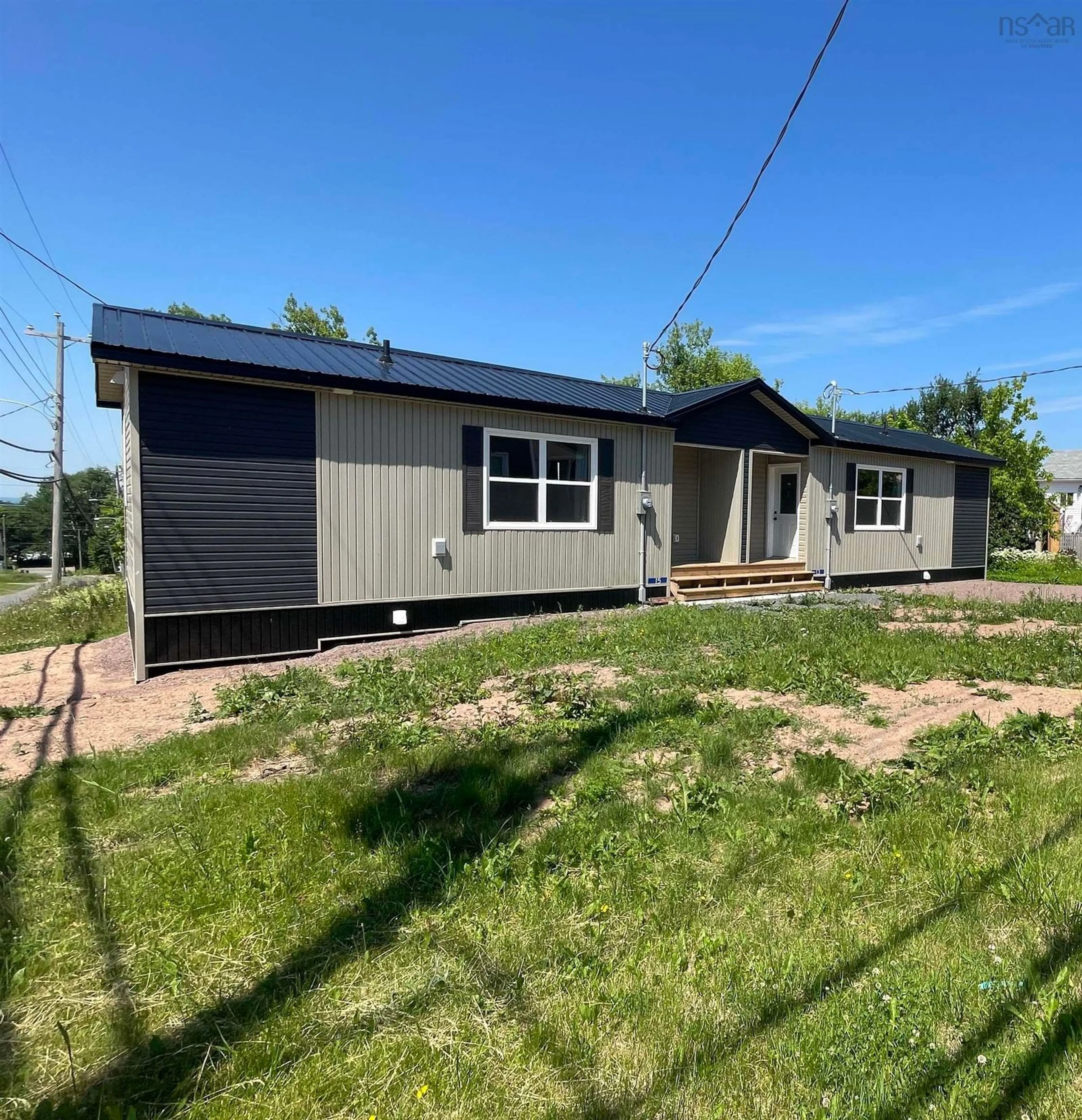 Home with vinyl exterior material, street for 13-15 Mechanic St, Springhill Nova Scotia B0M 1X0