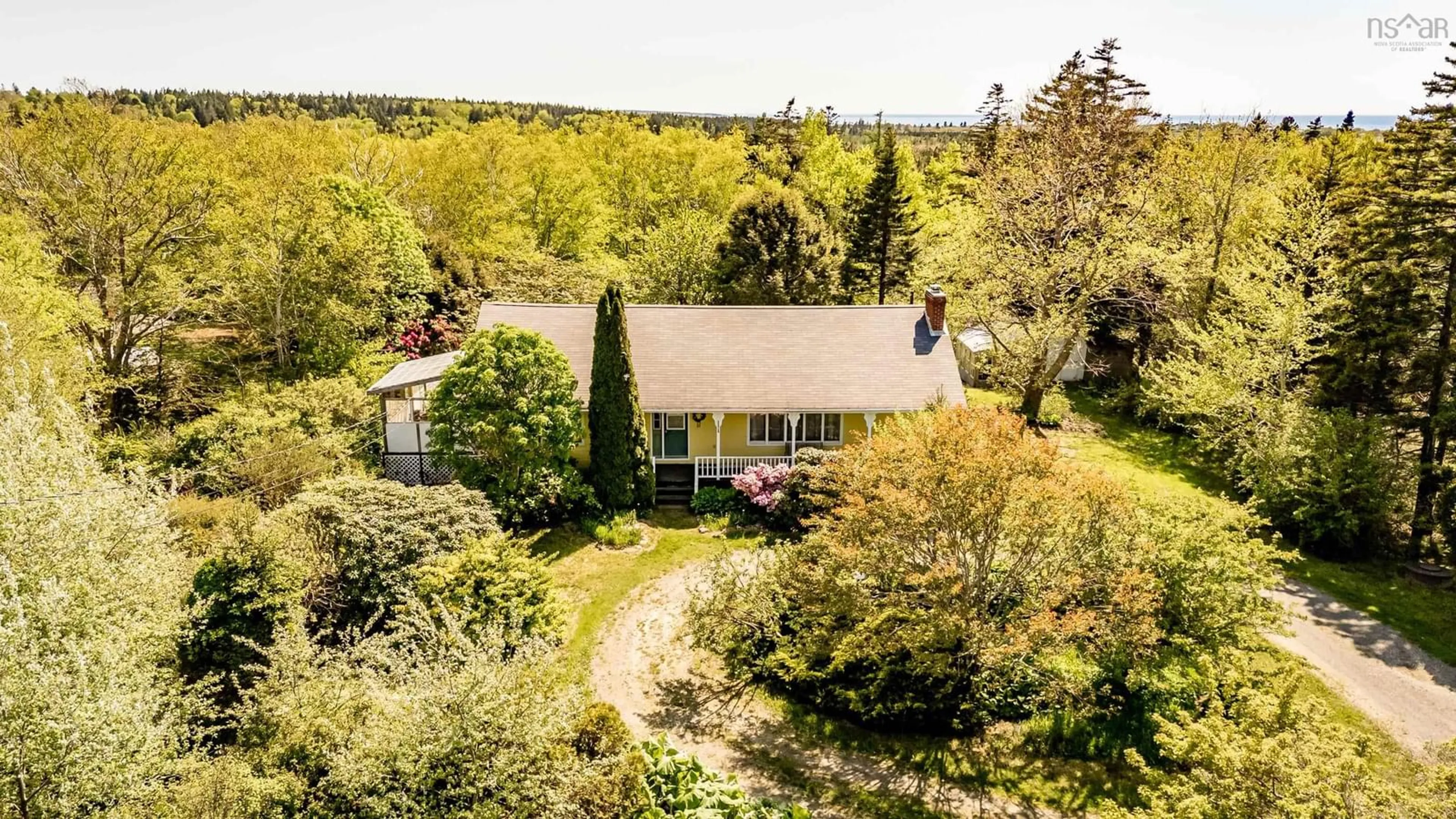 A pic from outside/outdoor area/front of a property/back of a property/a pic from drone, forest/trees view for 402 Saulnierville Rd, Saulnierville Nova Scotia B0W 2Z0