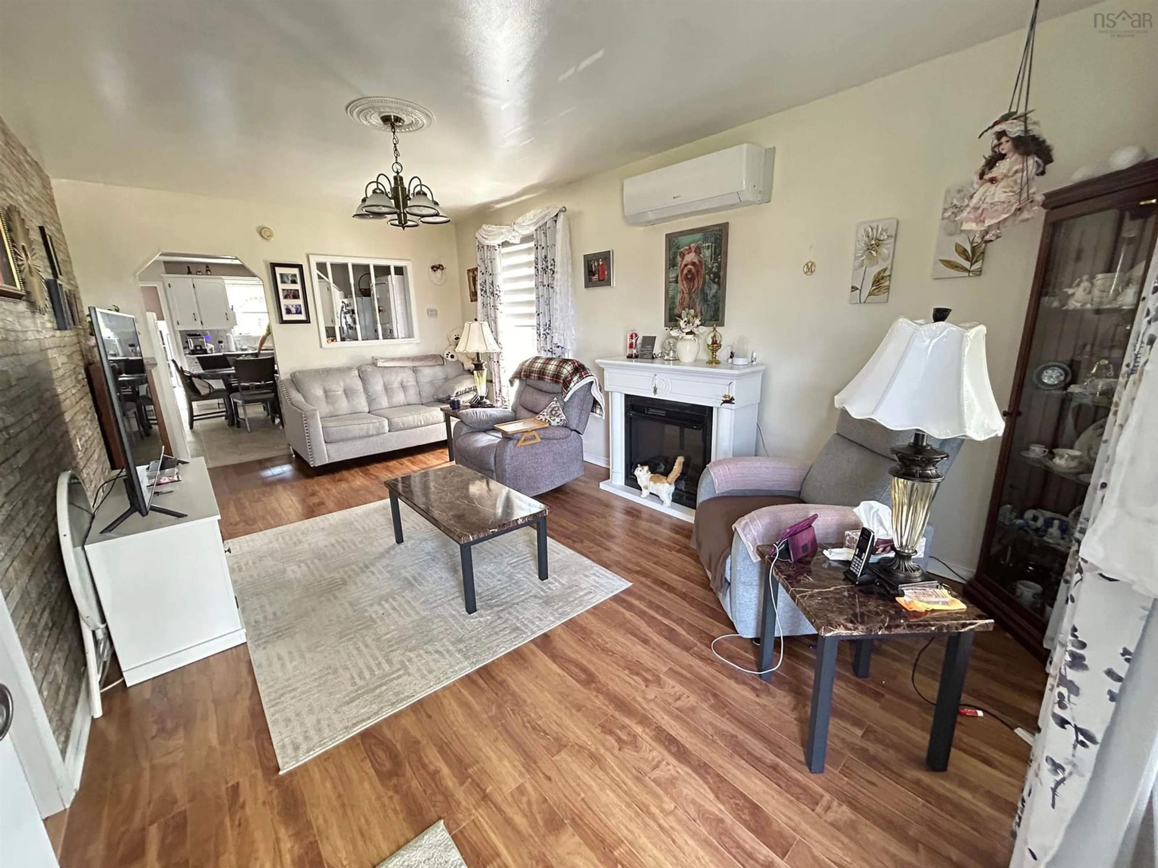 Living room with furniture, unknown for 11/13 Gordon Street, Glace Bay Nova Scotia B1A 3Z1