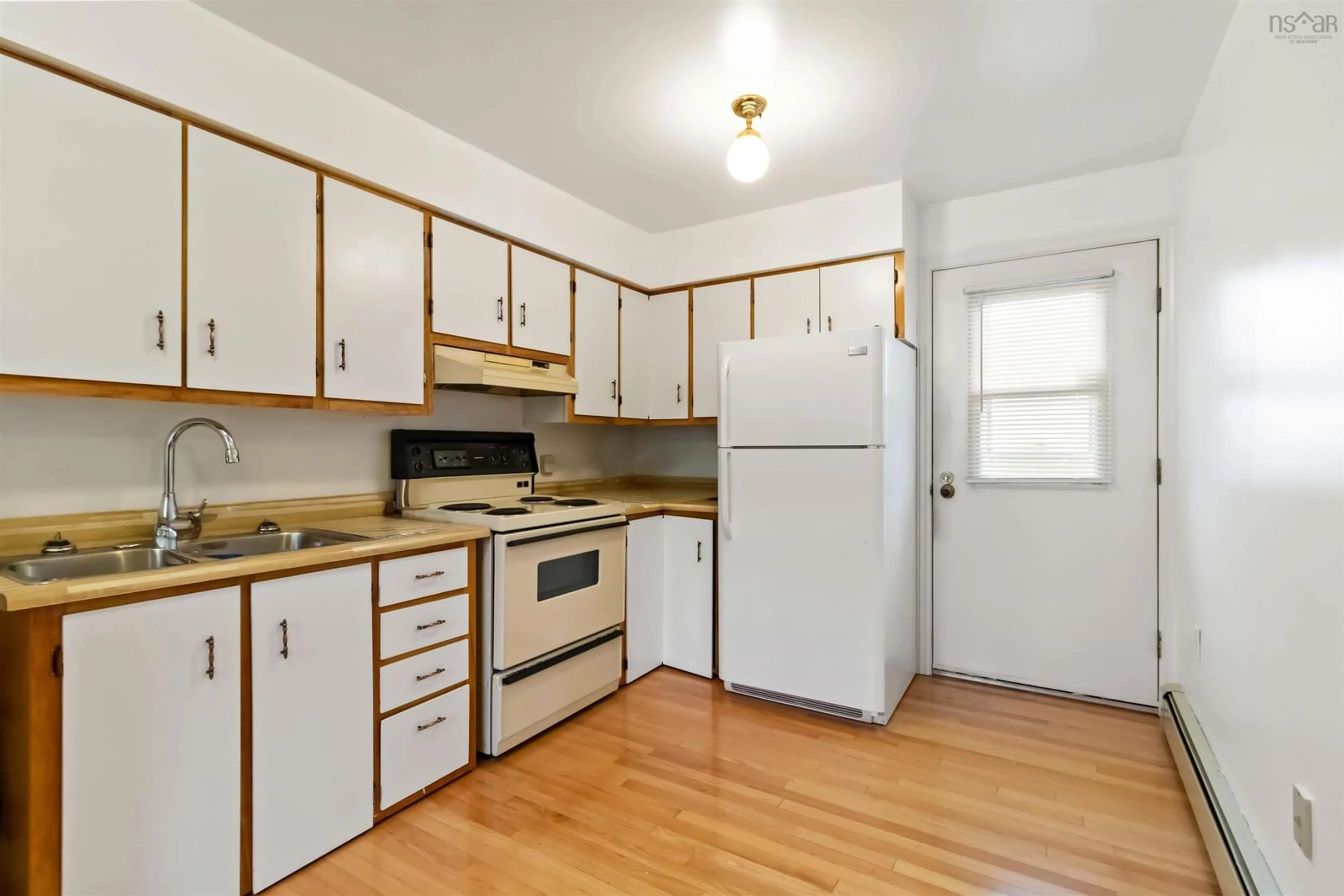 Standard kitchen, wood/laminate floor for 22 Prescott Dr, Westphal Nova Scotia B2W 3V8