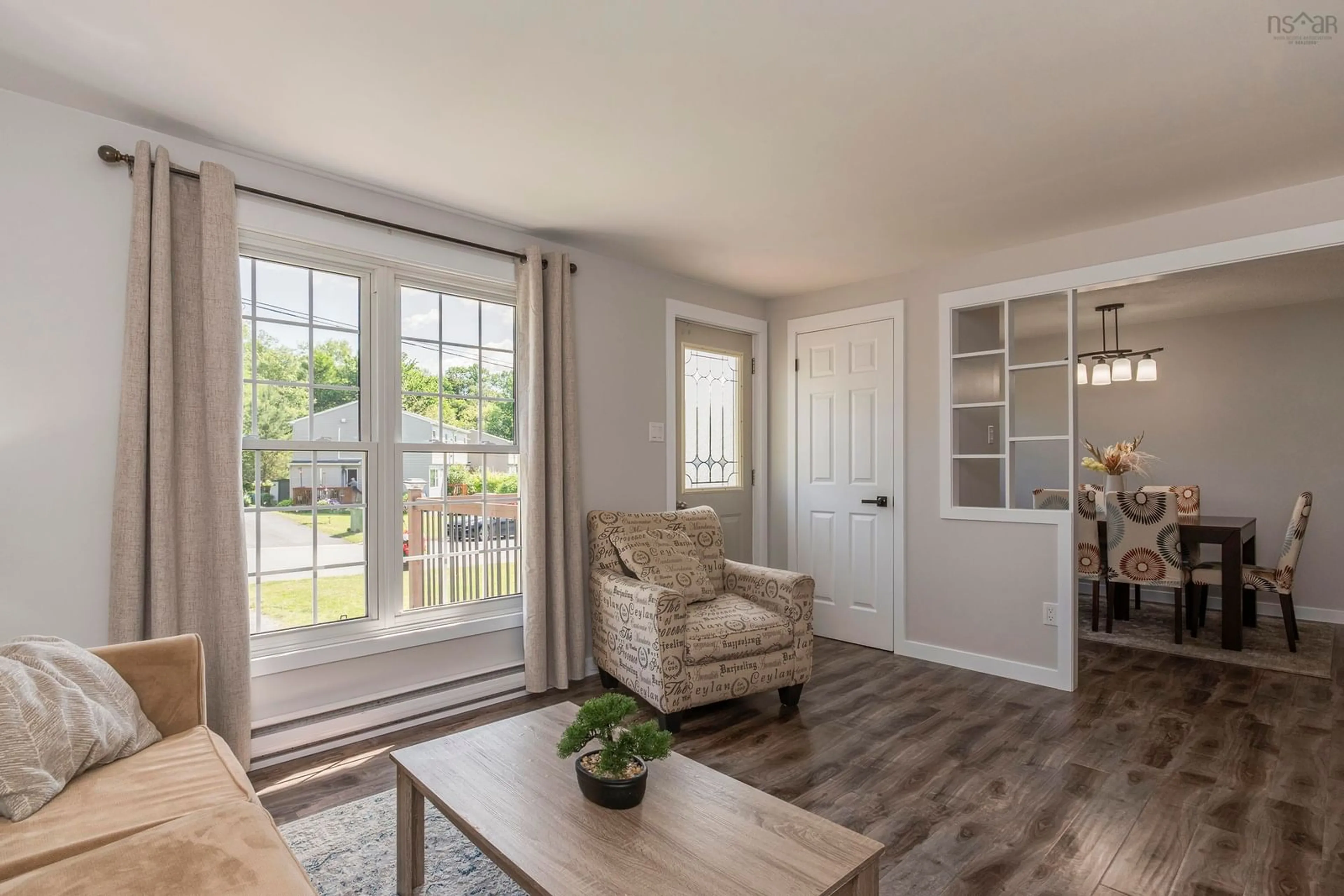 Living room with furniture, wood/laminate floor for 49 Rogers Dr, Lower Sackville Nova Scotia B4C 3G3