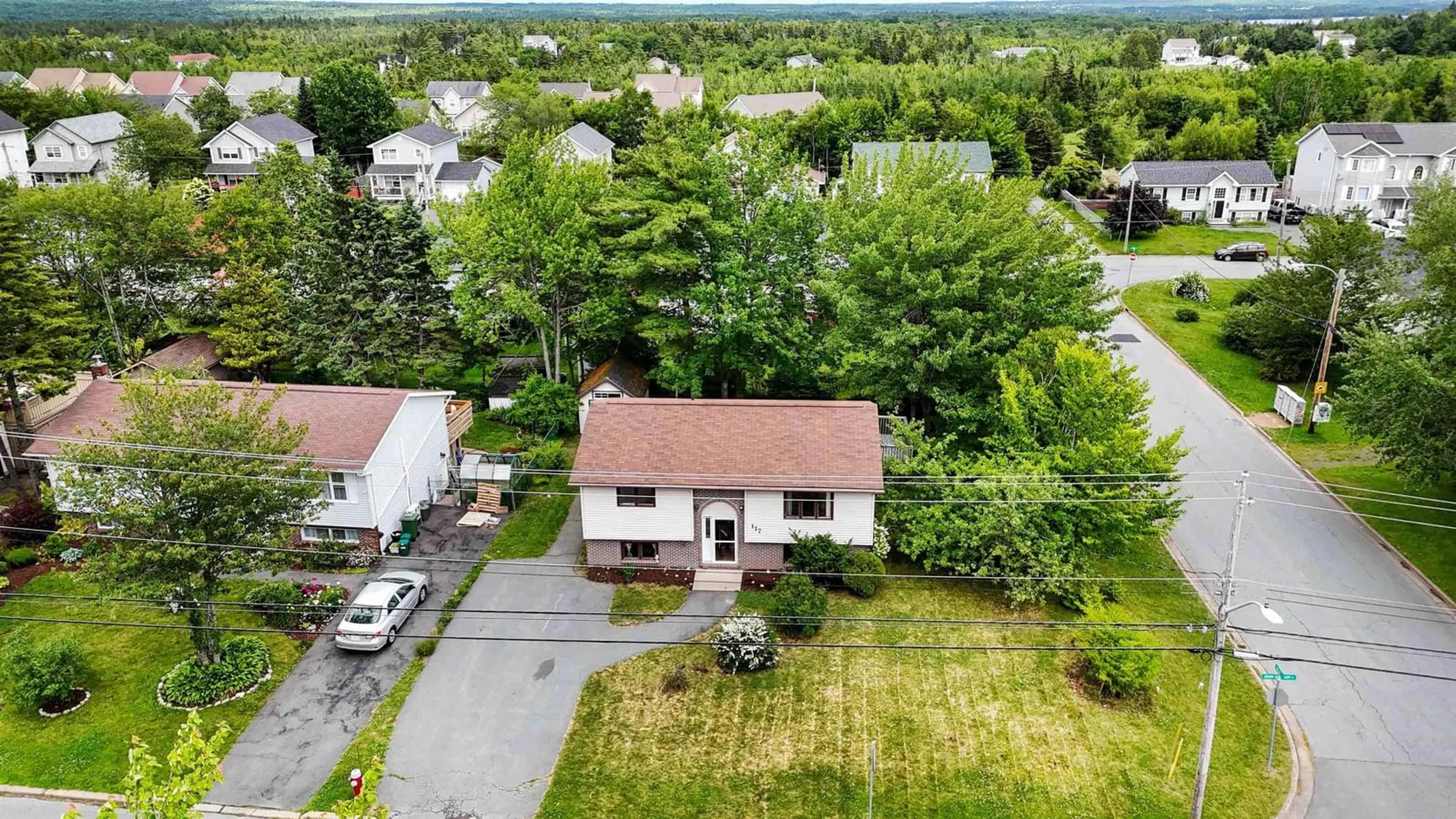 A pic from outside/outdoor area/front of a property/back of a property/a pic from drone, street for 117 John Stewart Dr, Cole Harbour Nova Scotia B2W 5W8