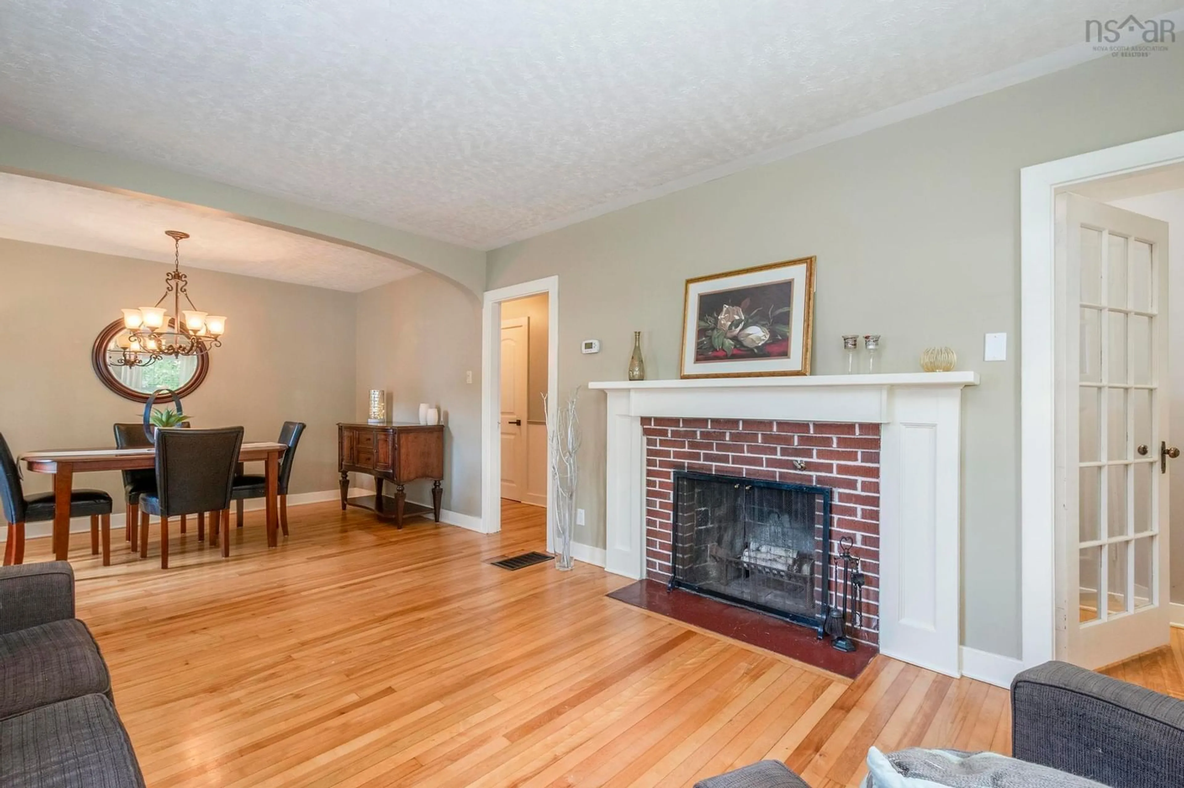 Living room with furniture, wood/laminate floor for 11 King Street, Middleton Nova Scotia B0S 1P0