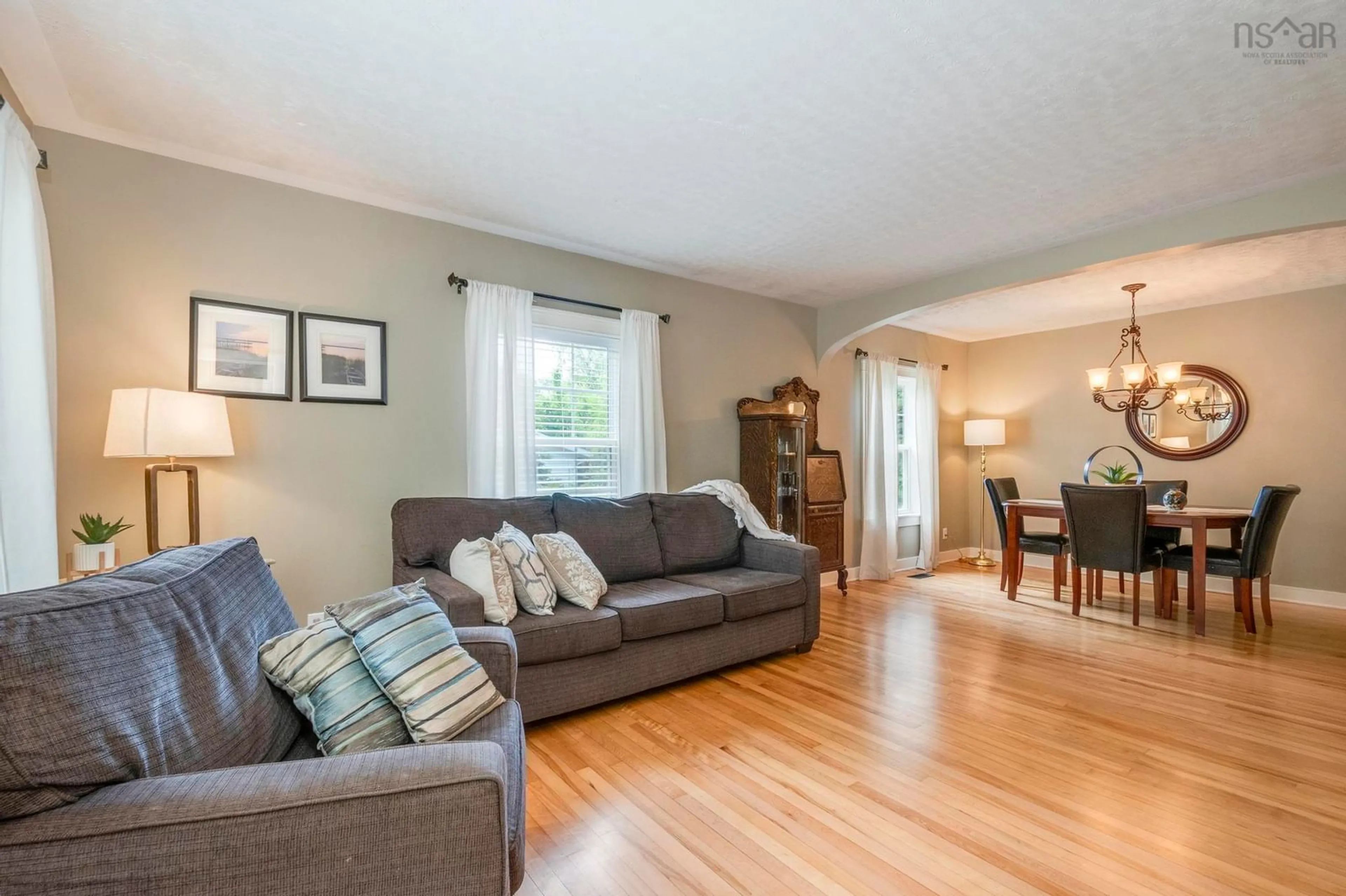 Living room with furniture, wood/laminate floor for 11 King Street, Middleton Nova Scotia B0S 1P0