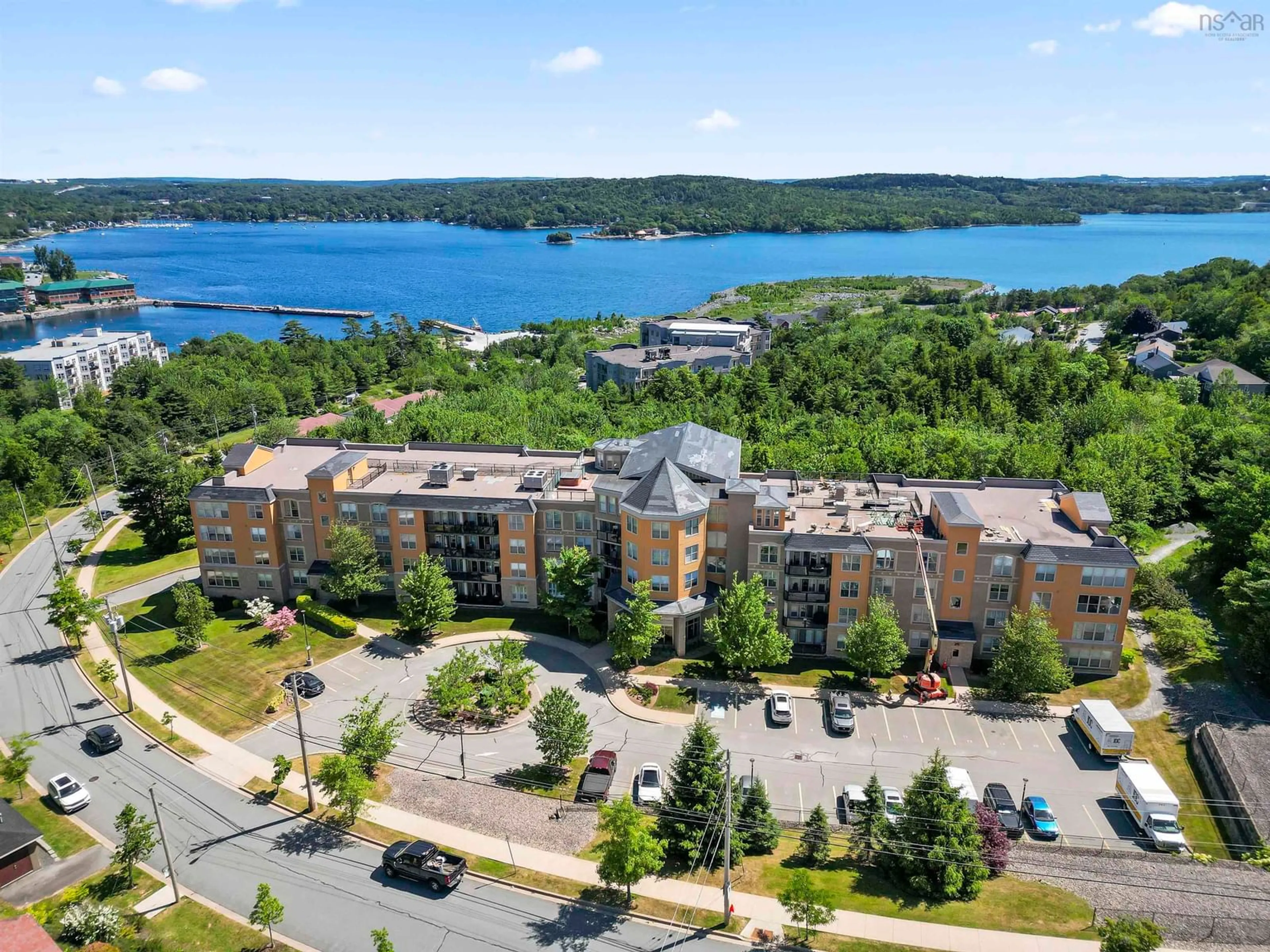 A pic from outside/outdoor area/front of a property/back of a property/a pic from drone, water/lake/river/ocean view for 120 Southgate Dr #102, Bedford Nova Scotia B4A 0B1