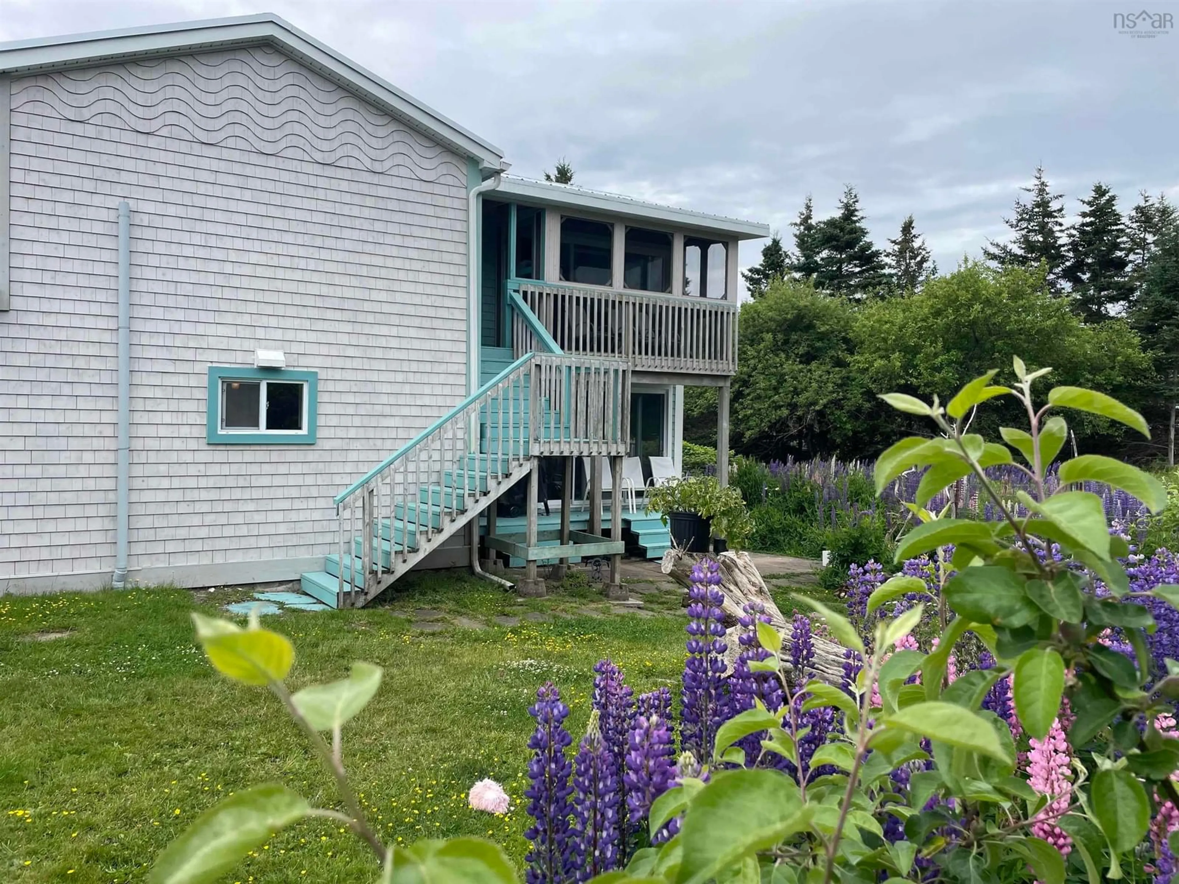 A pic from outside/outdoor area/front of a property/back of a property/a pic from drone, water/lake/river/ocean view for 3067 Highway 320, D'Escousse Nova Scotia B0E 1K0