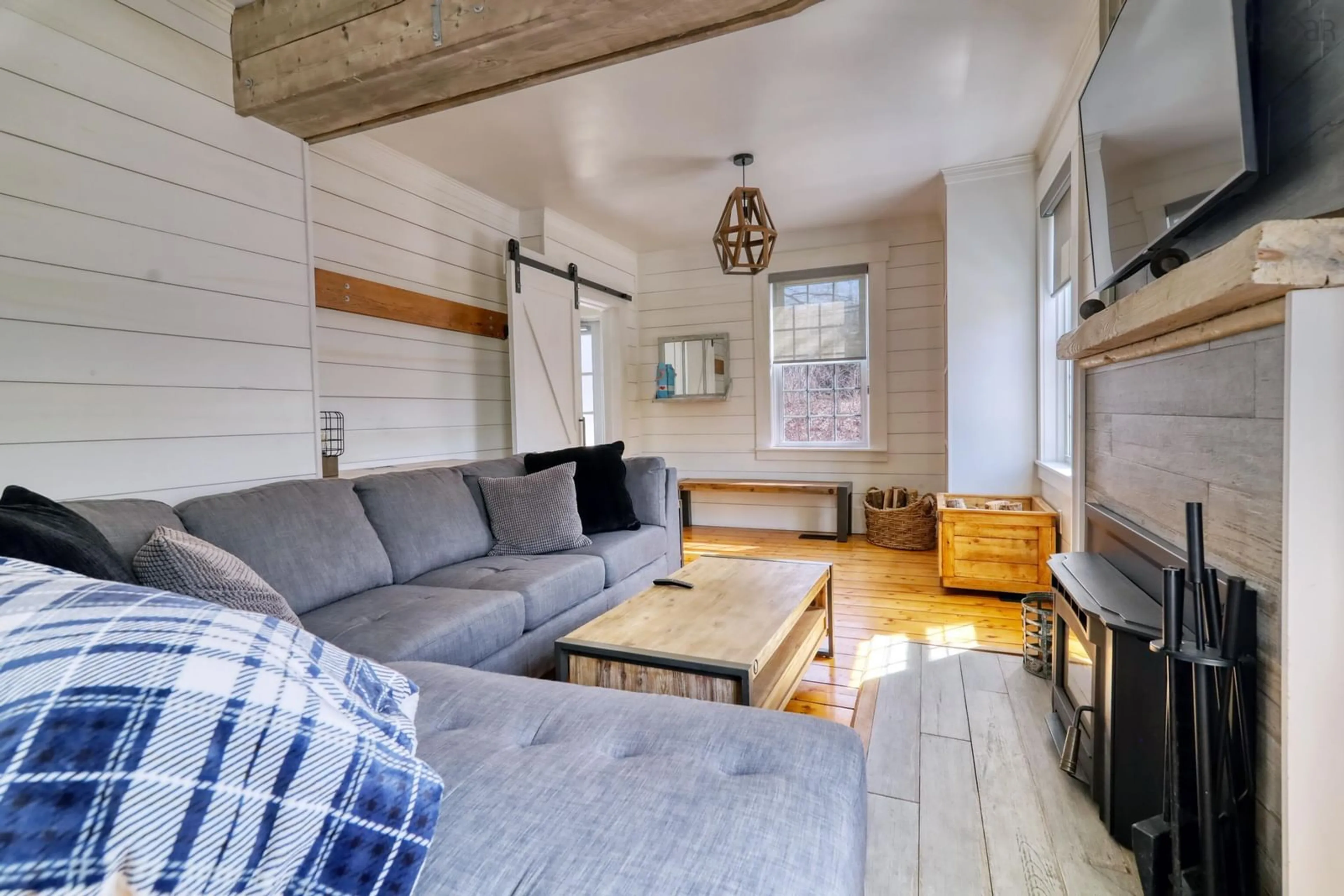 Living room with furniture, wood/laminate floor for 142 Woodstock Rd, Clearland Nova Scotia B0J 2E0