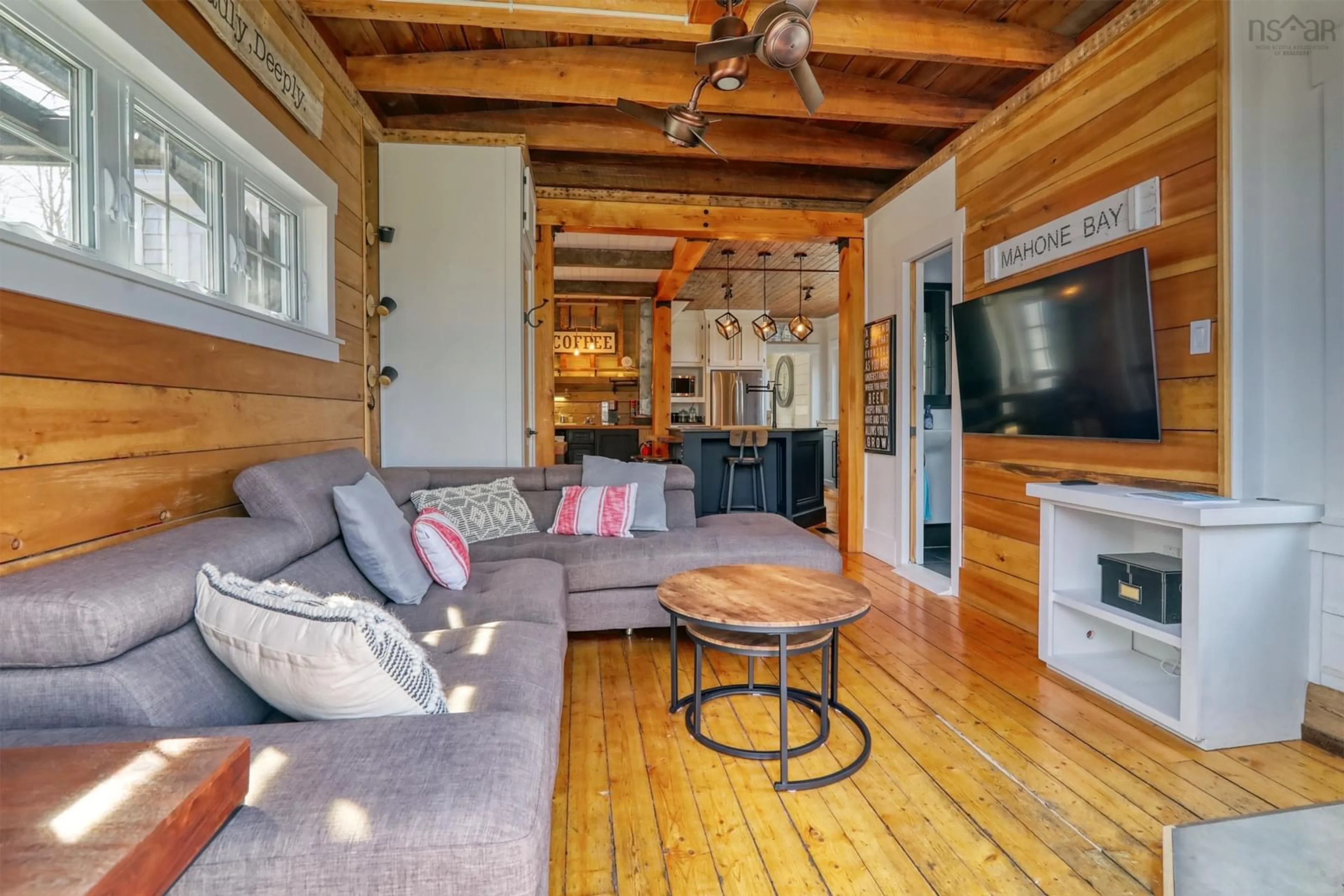 Living room with furniture, wood/laminate floor for 142 Woodstock Rd, Clearland Nova Scotia B0J 2E0