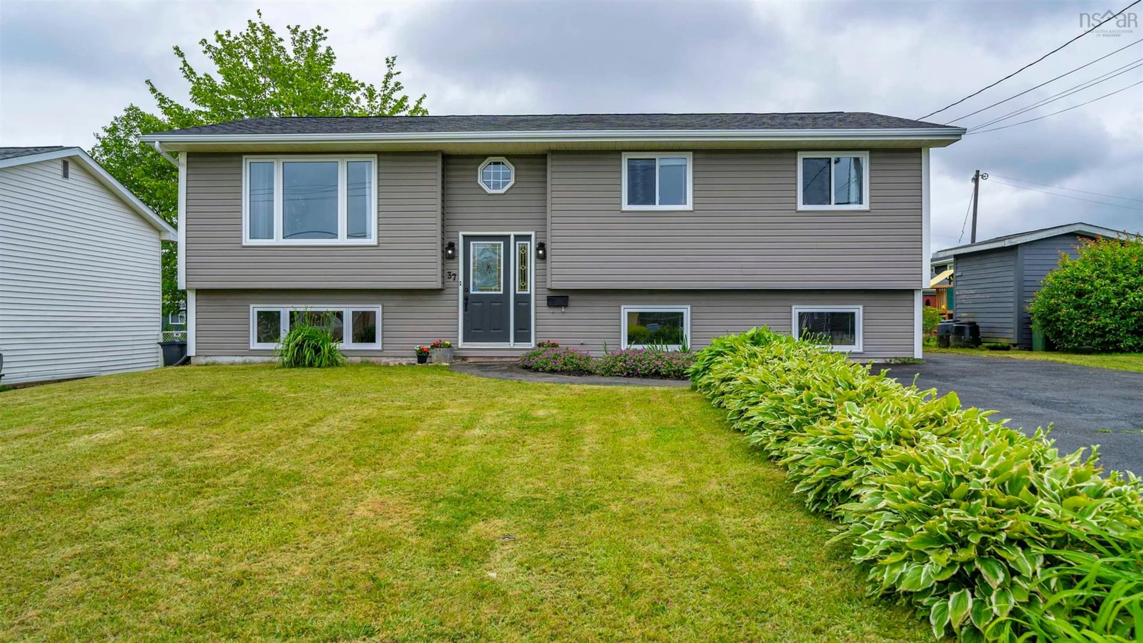 Home with vinyl exterior material, street for 37 Astral Dr, Cole Harbour Nova Scotia B2V 1B4