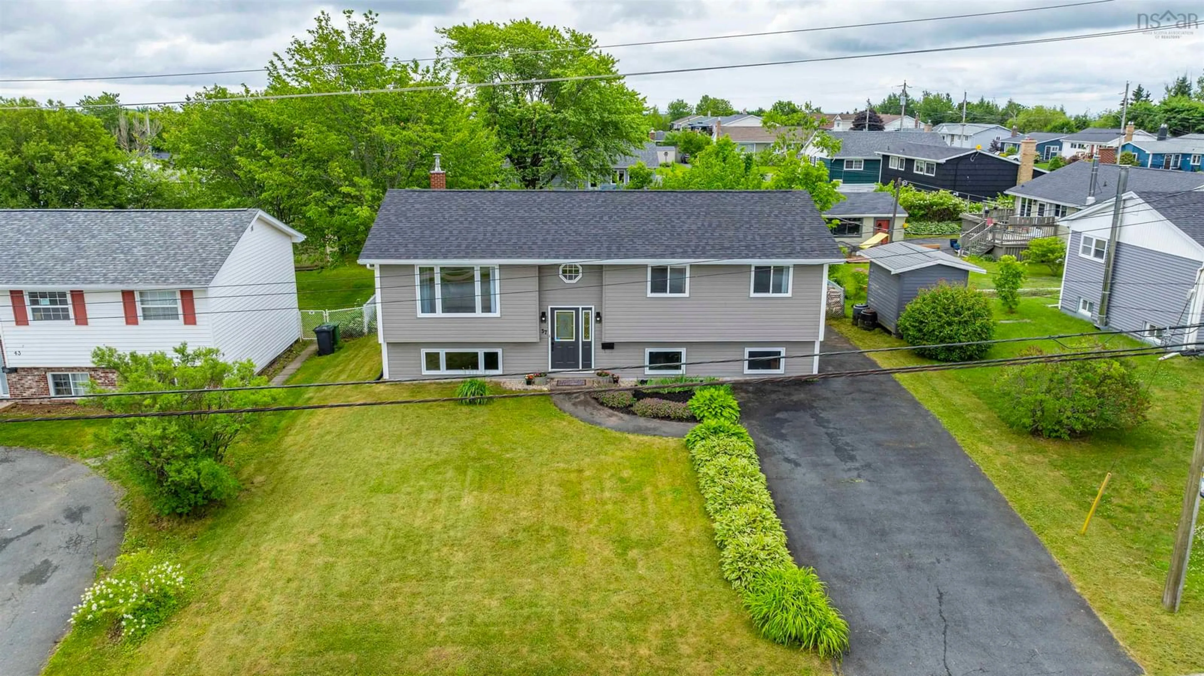 A pic from outside/outdoor area/front of a property/back of a property/a pic from drone, street for 37 Astral Dr, Cole Harbour Nova Scotia B2V 1B4